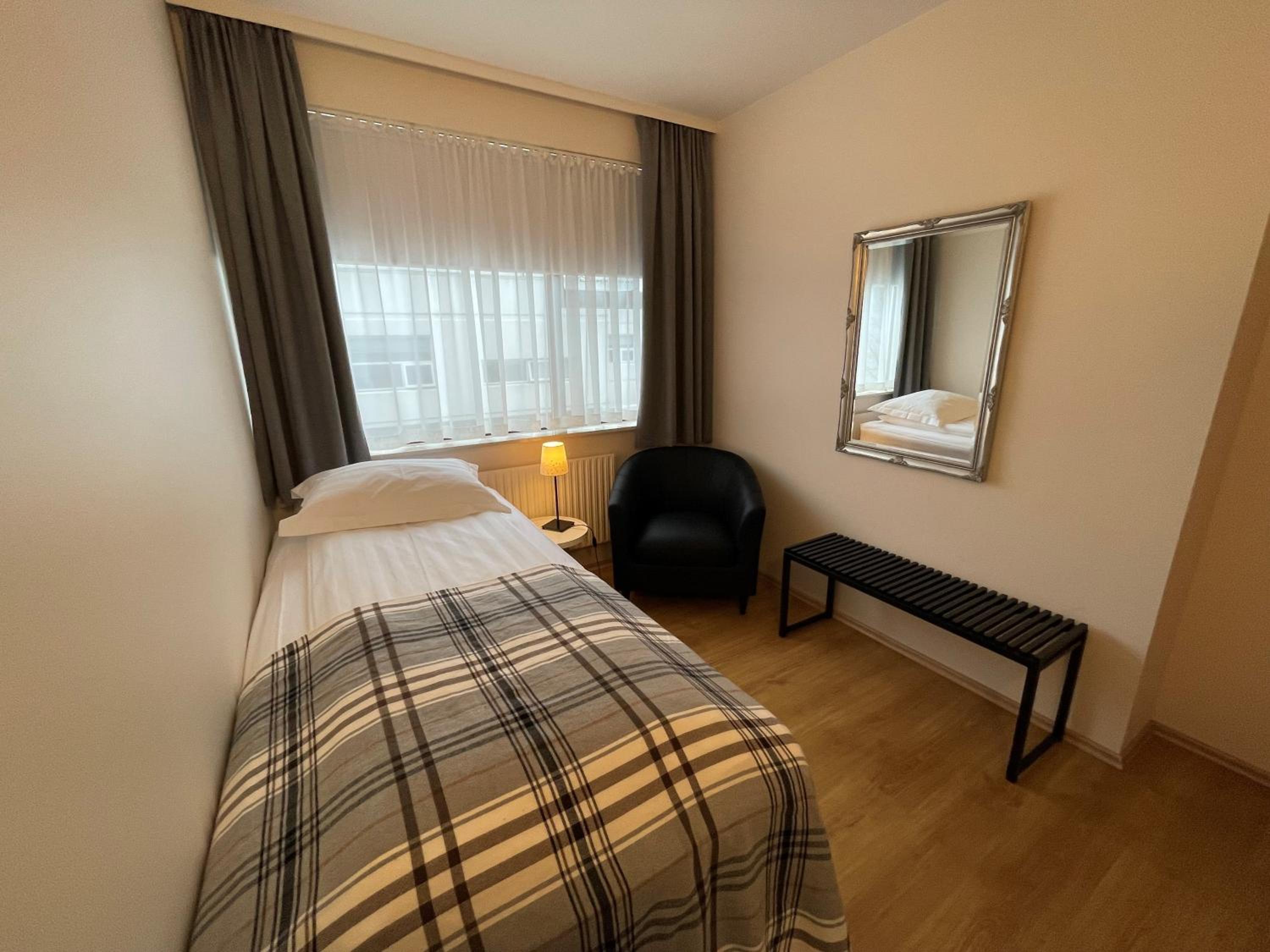 Basic Single Room with Shared Bathroom