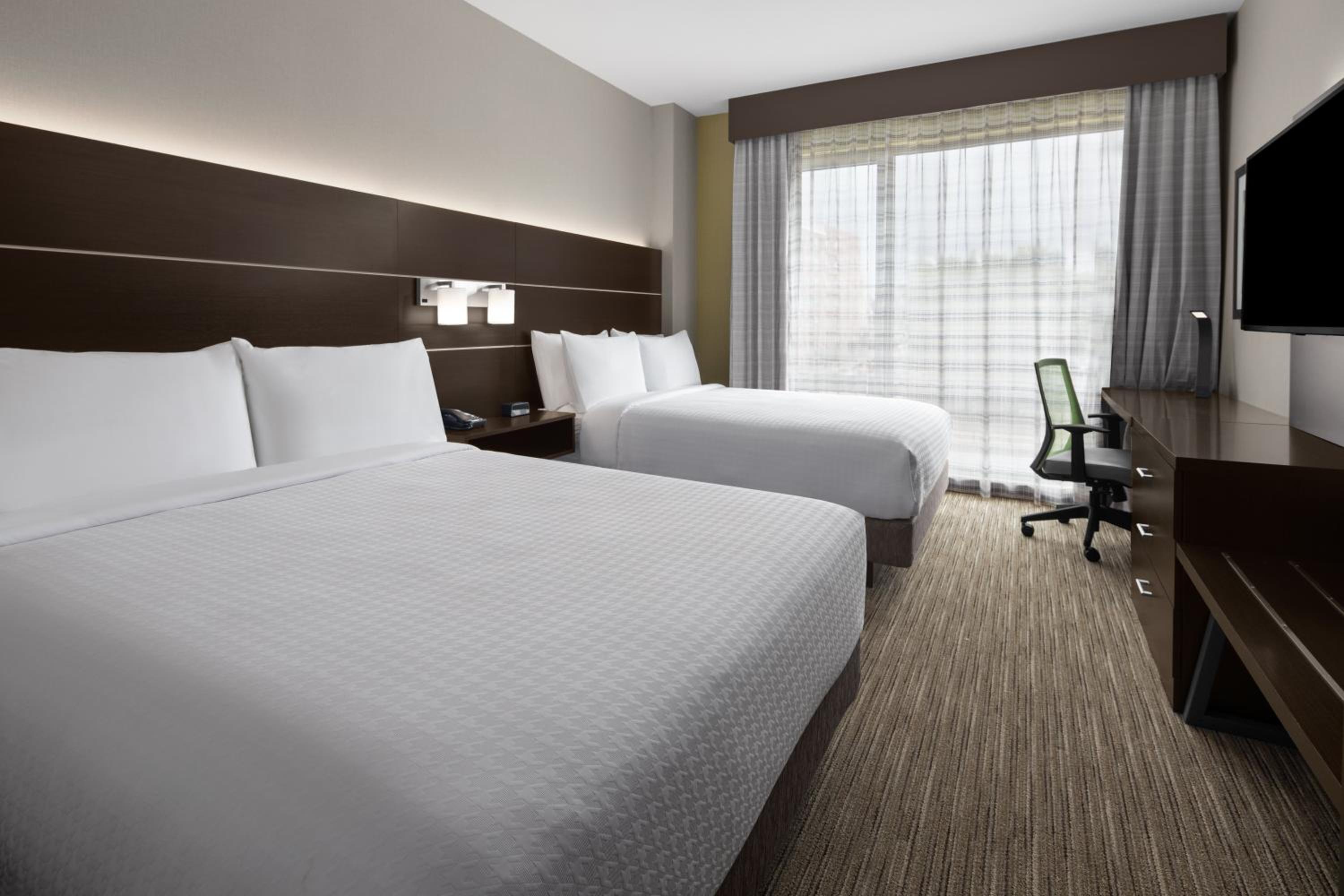 Standard Queen Room with Two Queen Beds - Photo 1