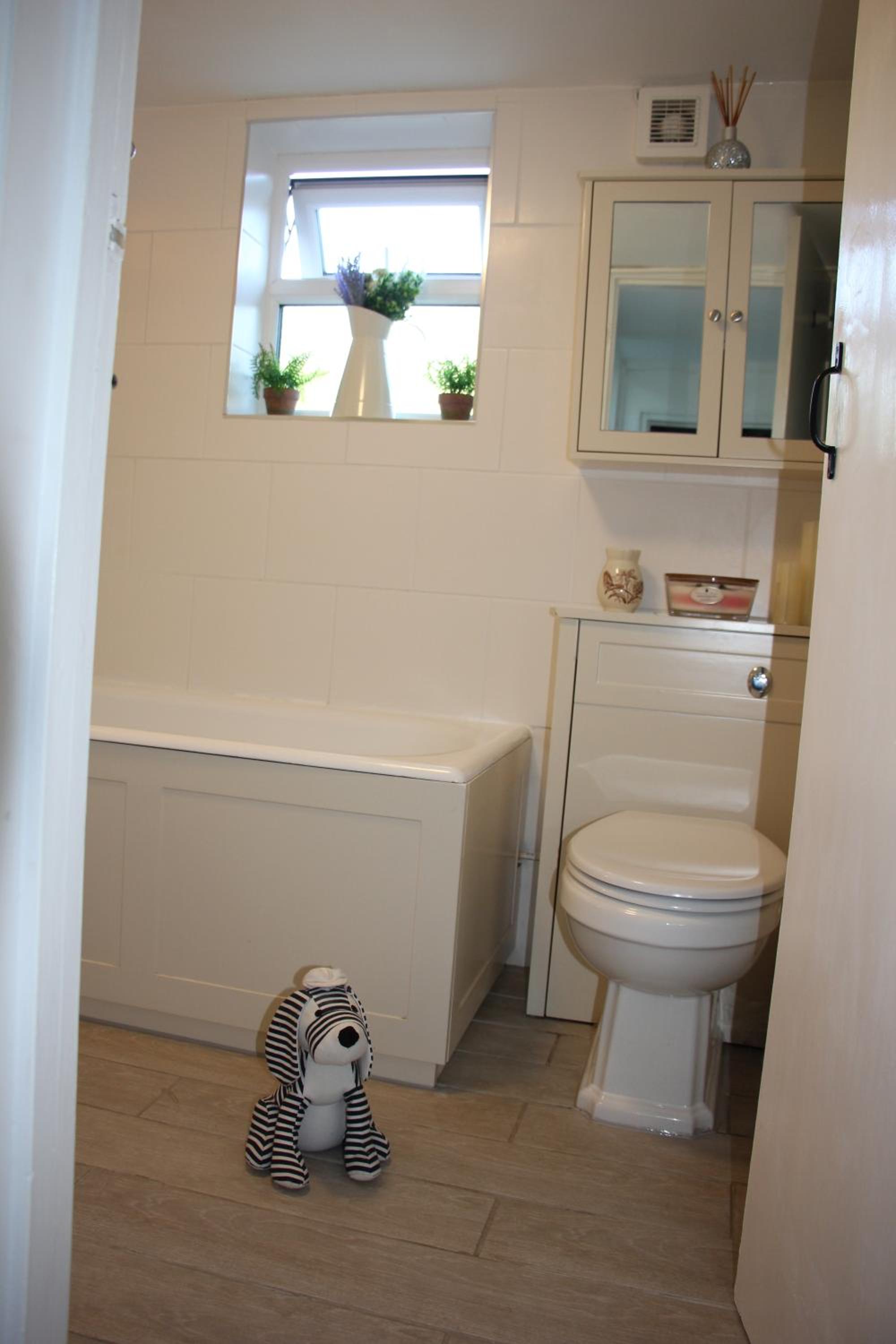 Three-Bedroom House - Photo 15