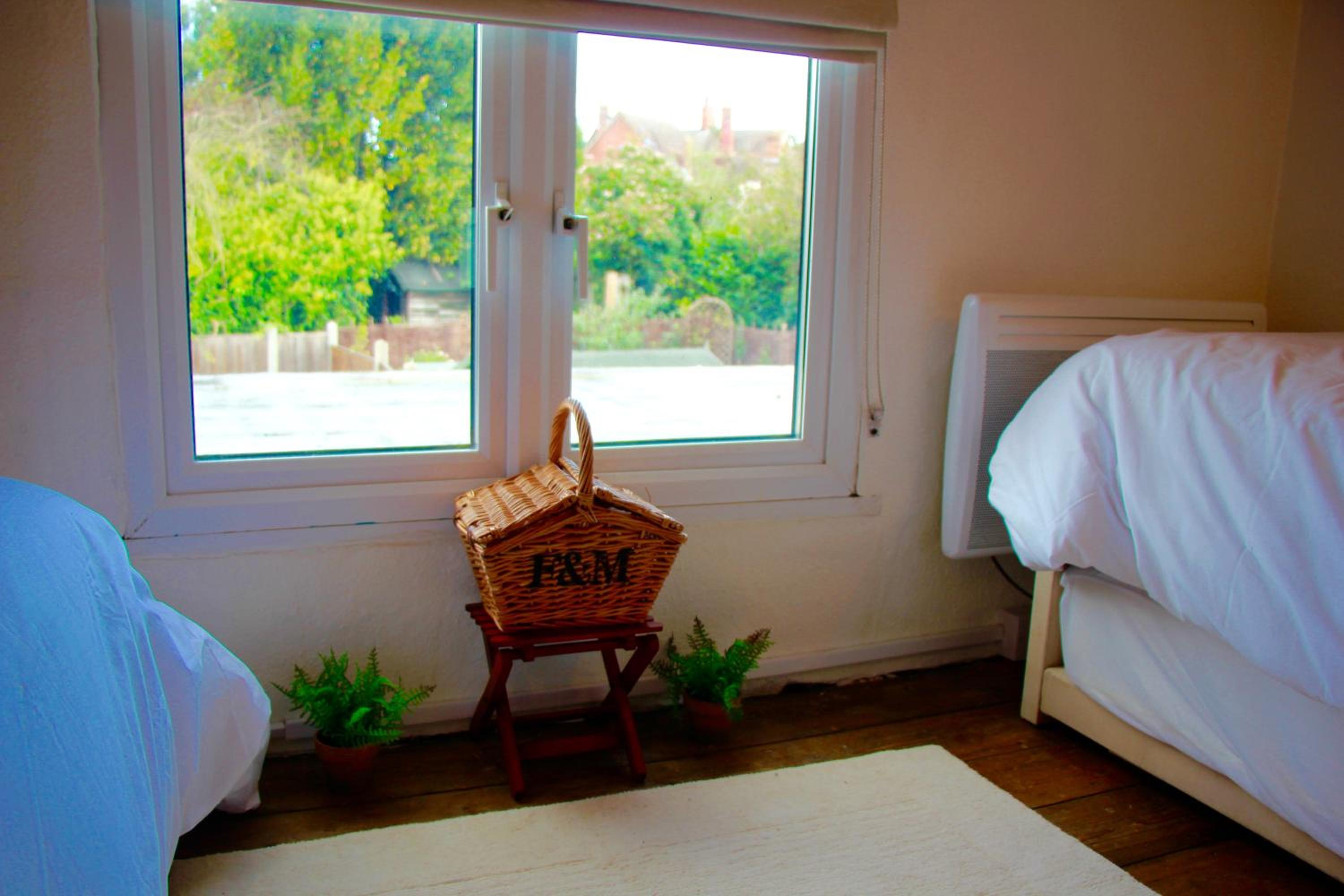 Three-Bedroom House - Photo 31