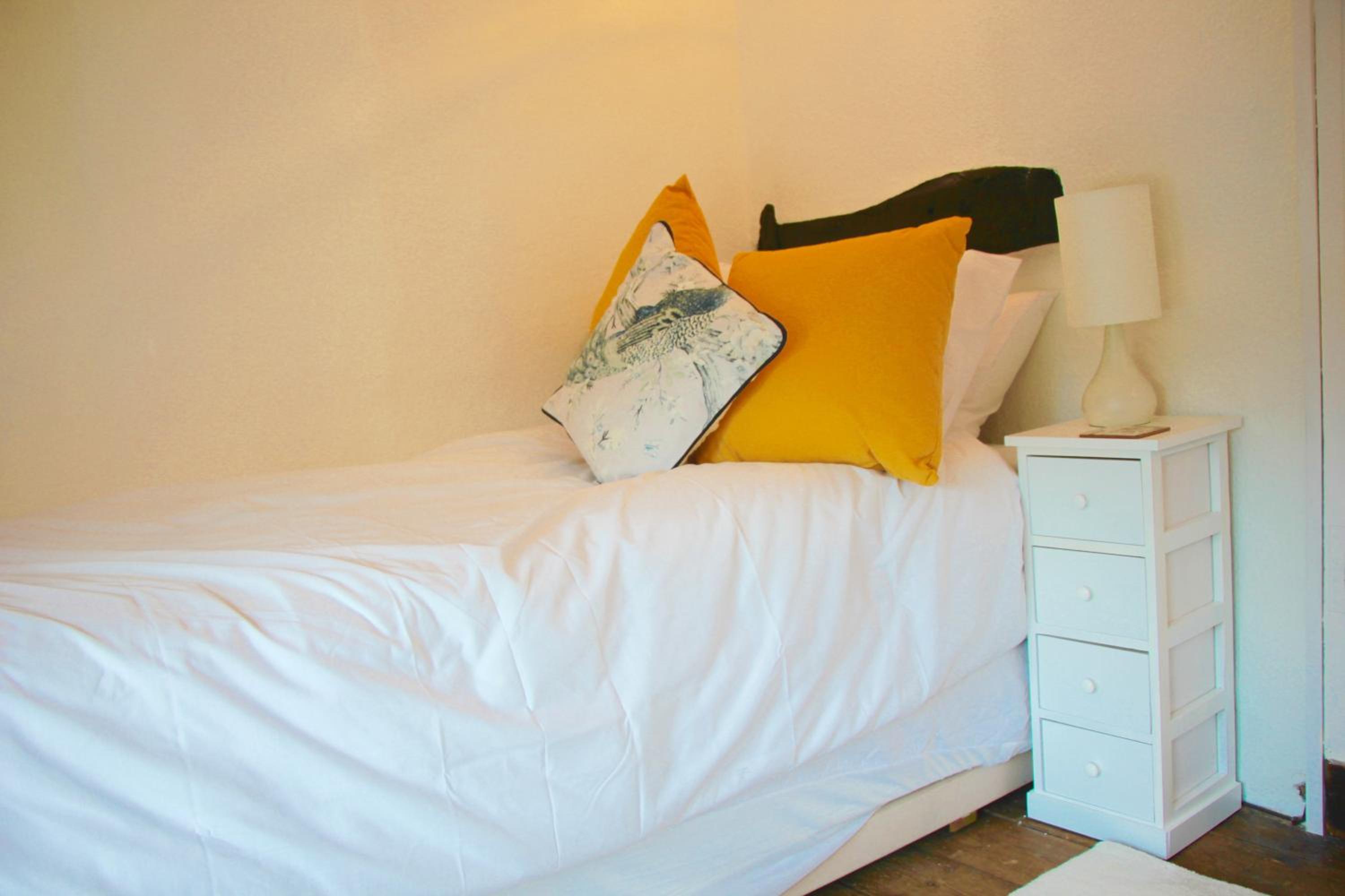 Three-Bedroom House - Photo 33