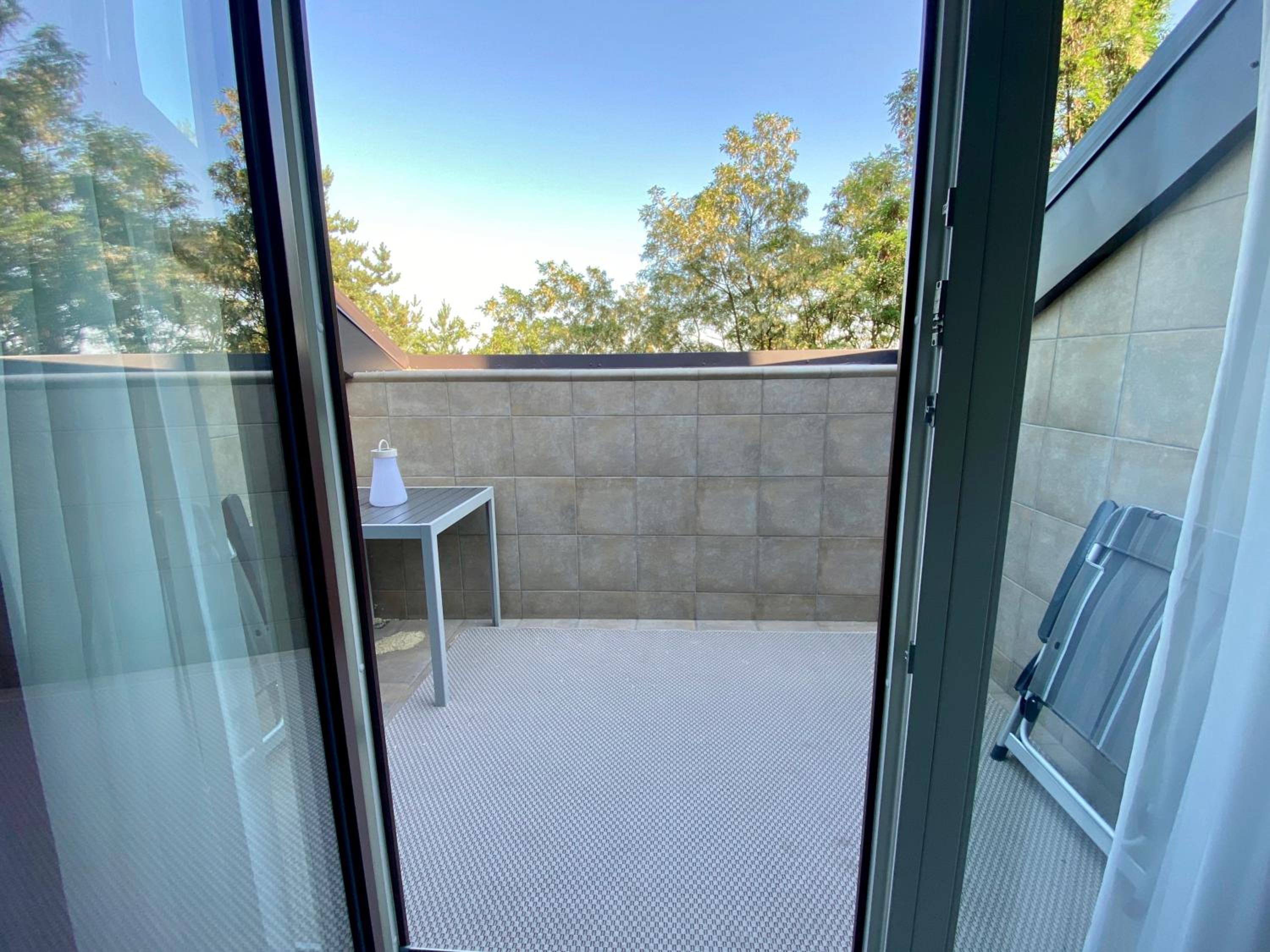 Family Room with Balcony - Photo 9