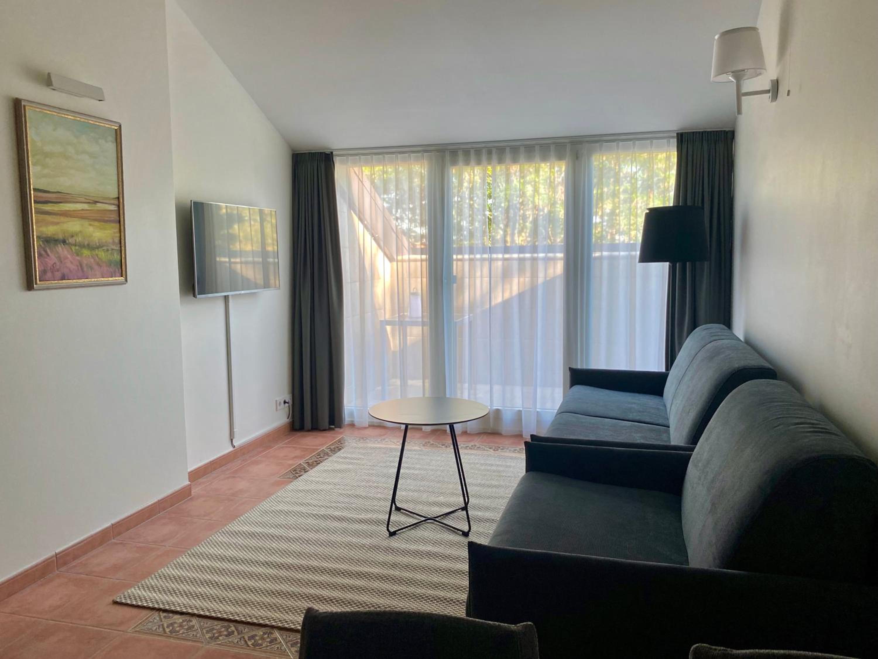 Family Room with Balcony - Photo 11