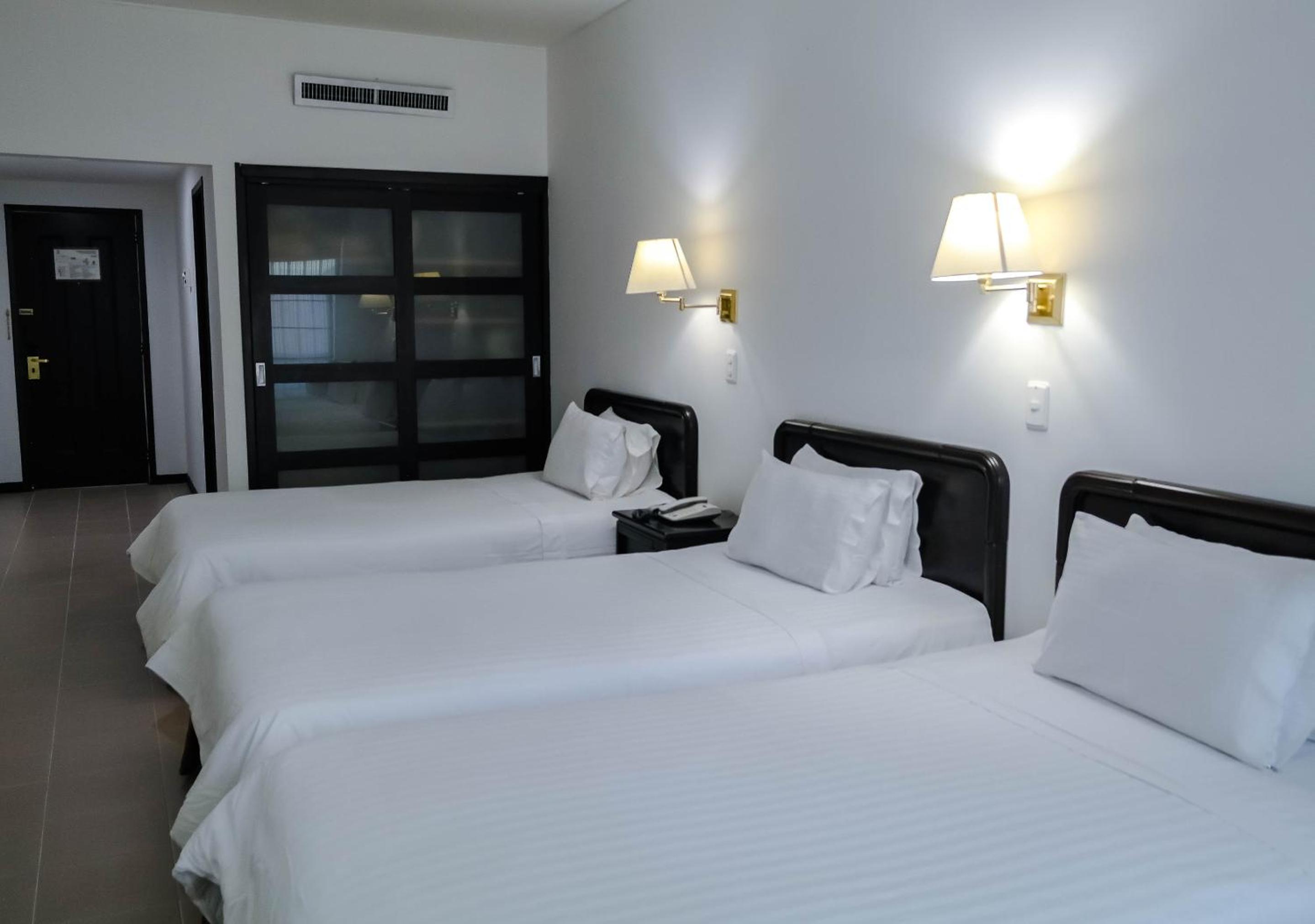 Triple Room - Photo 1
