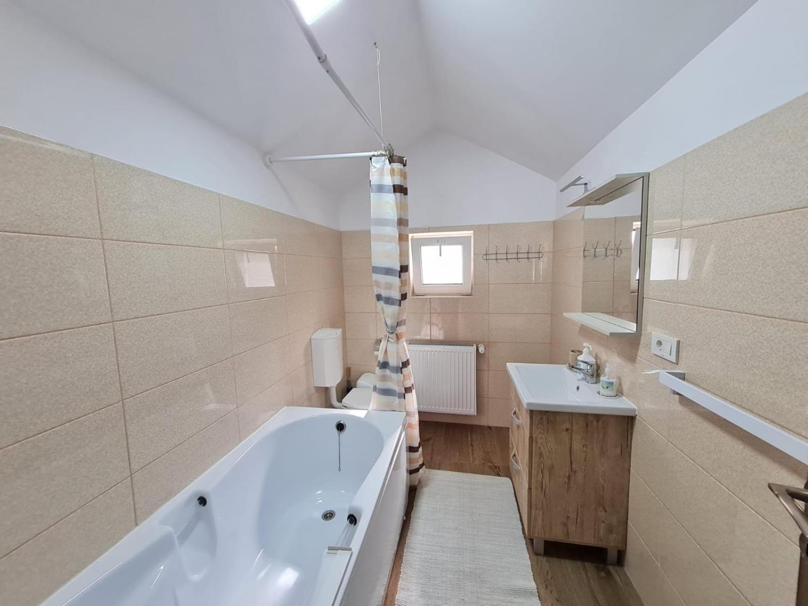 Three-Bedroom Apartment - Photo 42