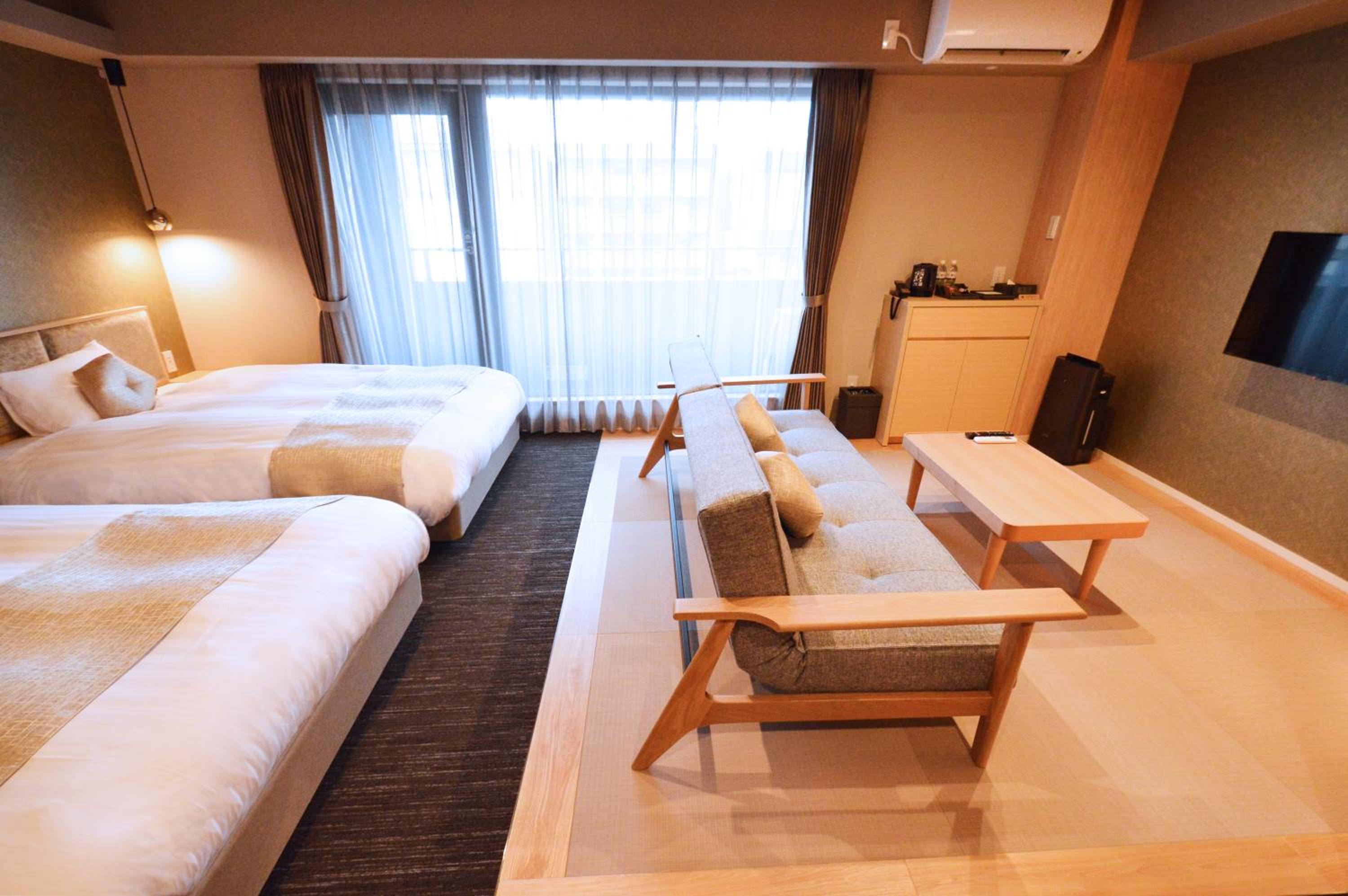 Deluxe Twin Room - Photo 10