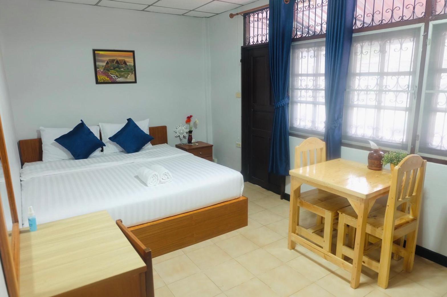 Deluxe Room (2 Adults + 1 Child) - Photo 1