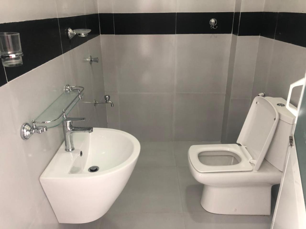 Basic Triple Room With Shared Bathroom photo 1