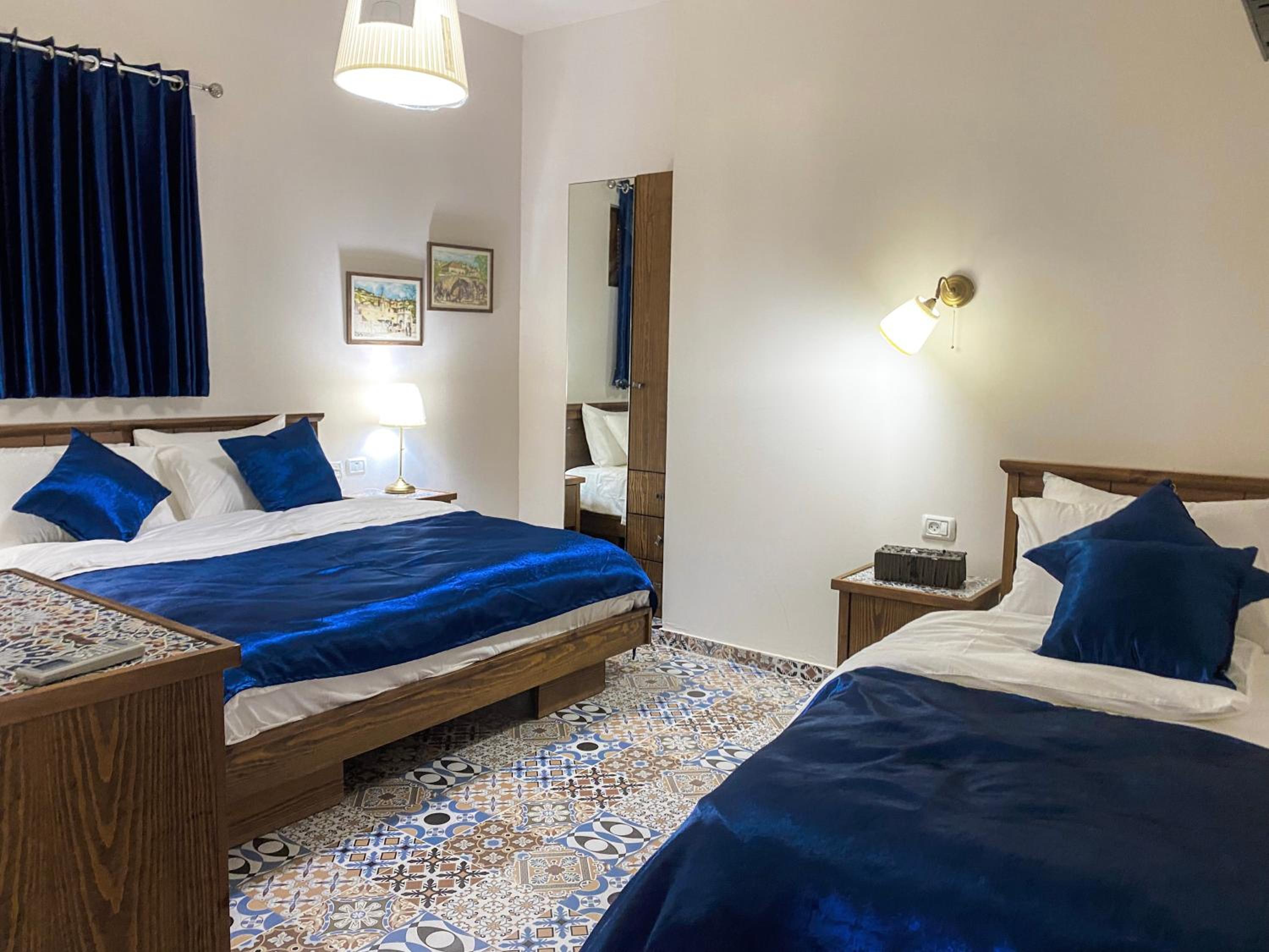 Deluxe Triple Room - Photo 7