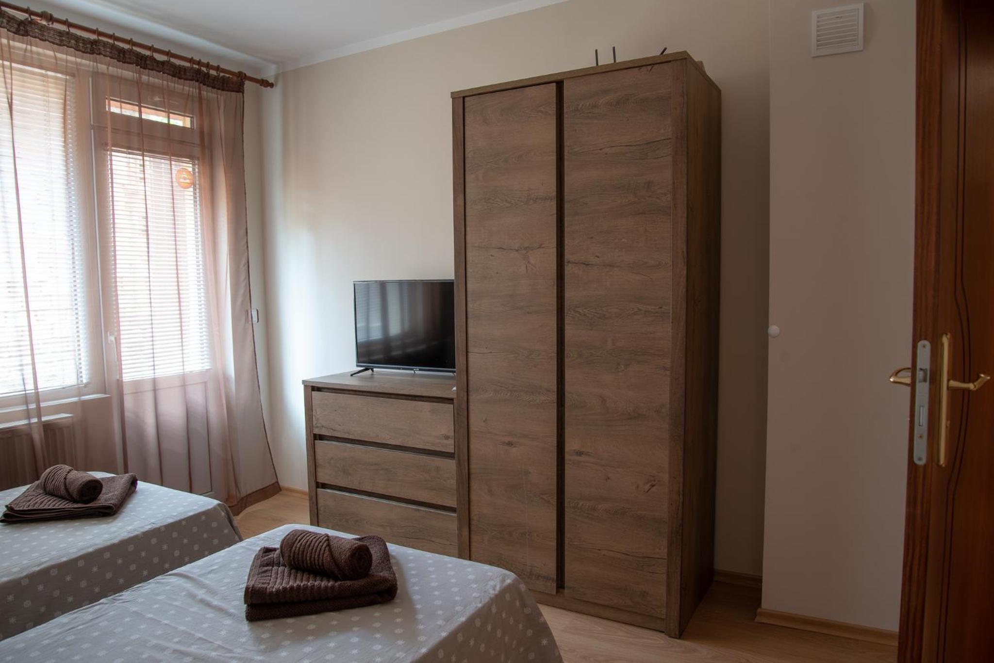 Three-Bedroom Apartment - Photo 11