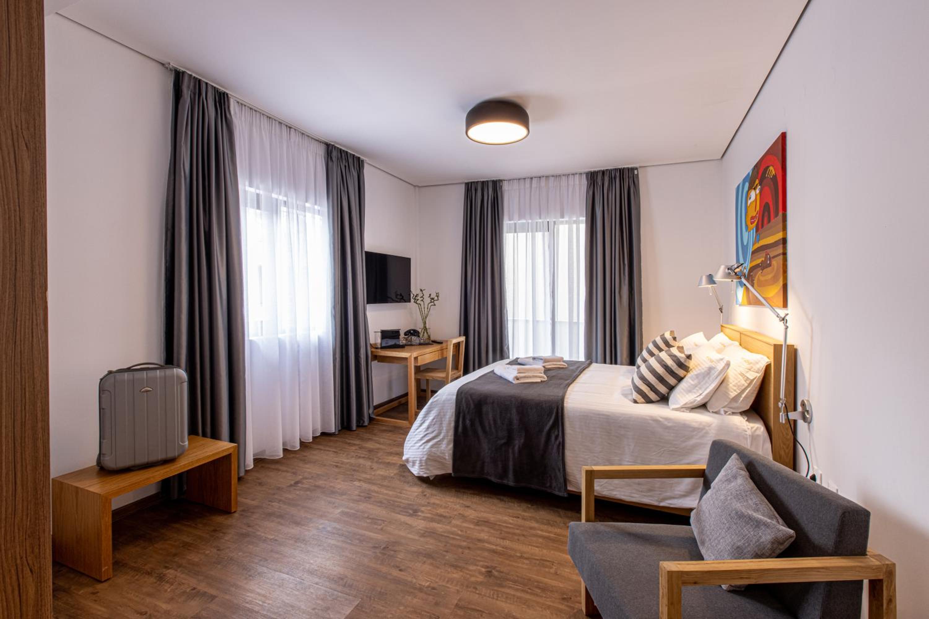 Deluxe Double Room with Balcony - Photo 1