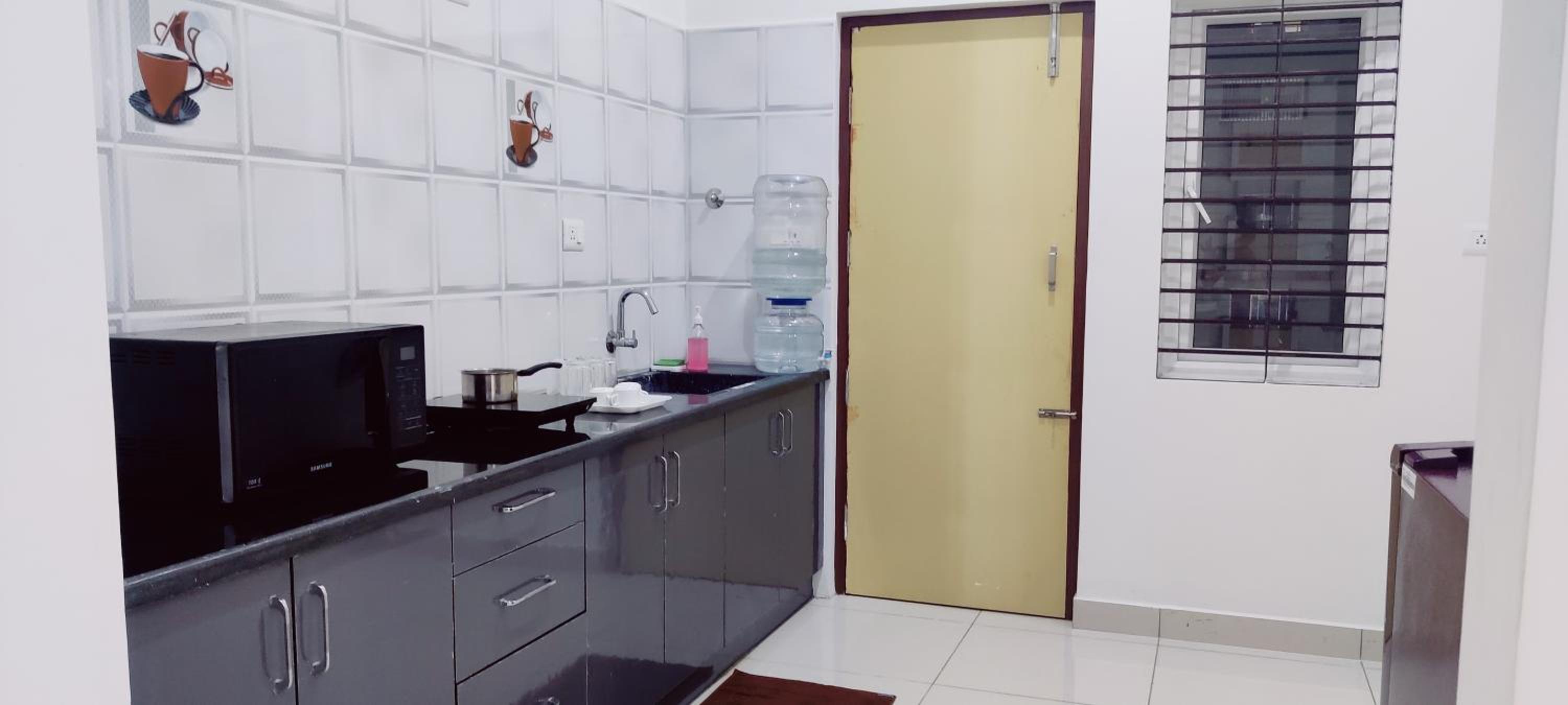 Three-Bedroom Apartment - Photo 19
