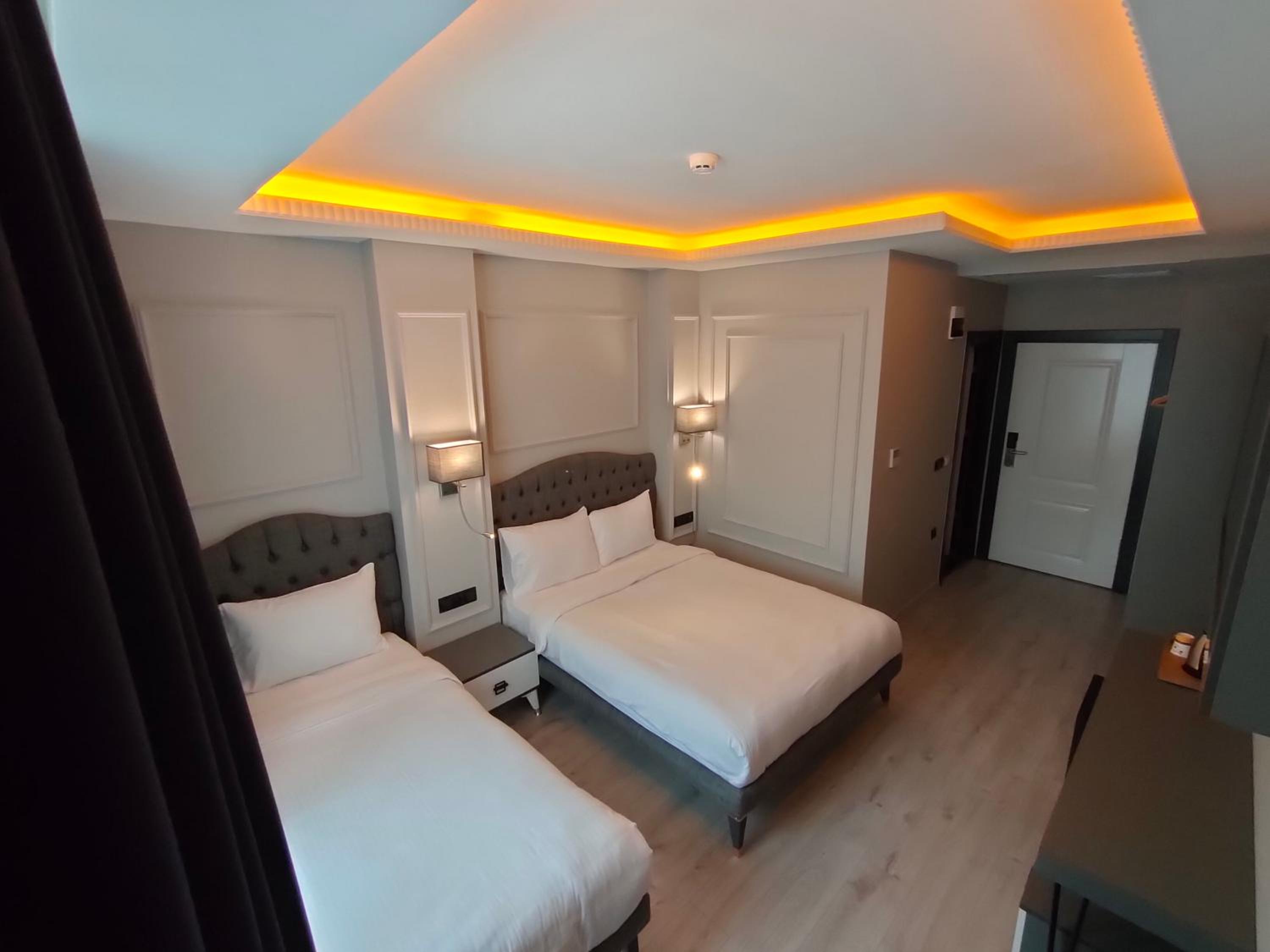 Deluxe Triple Room - Photo 1