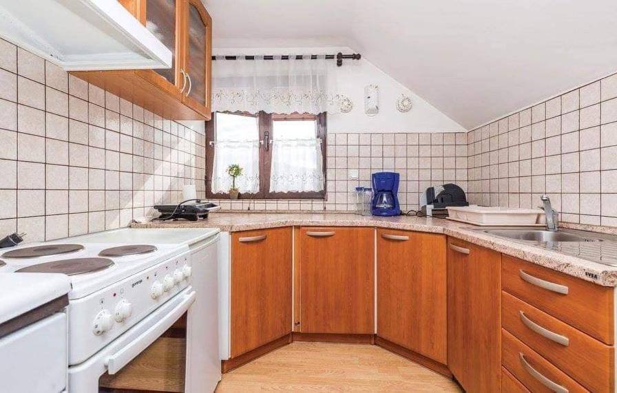 Three-Bedroom Apartment - Photo 13