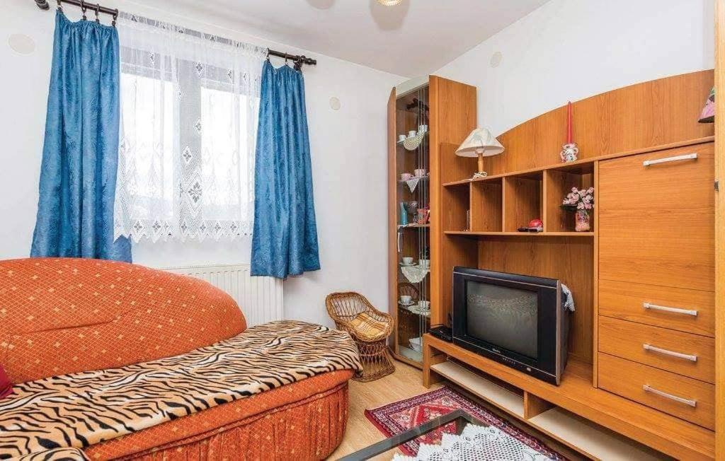 Three-Bedroom Apartment - Photo 1