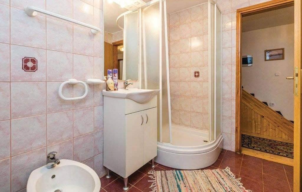 Three-Bedroom Apartment - Photo 14