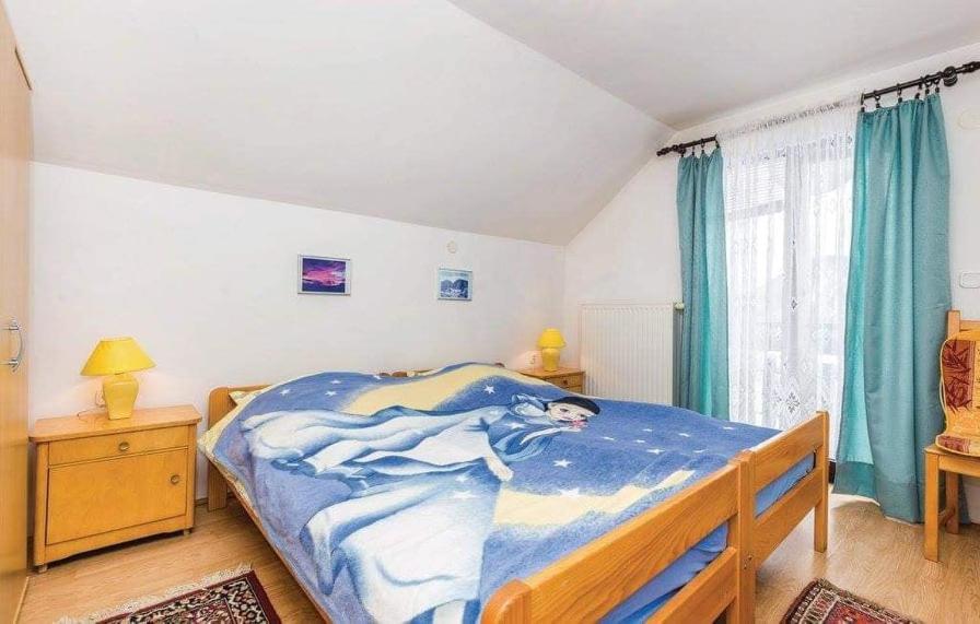 Three-Bedroom Apartment - Photo 15