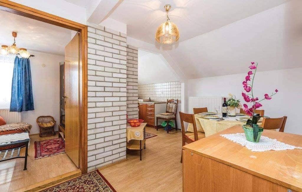 Three-Bedroom Apartment - Photo 4