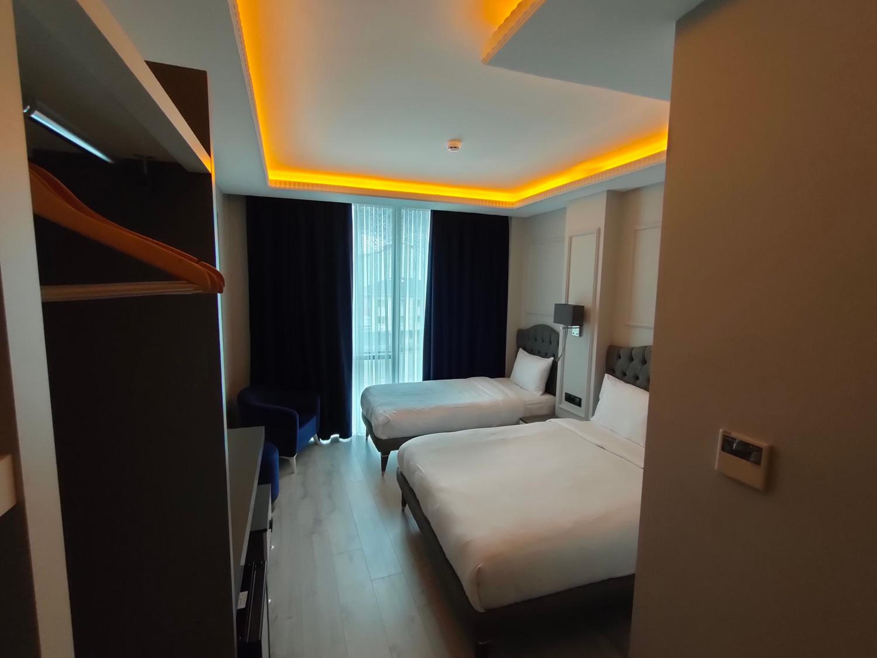 Deluxe Triple Room - Photo 10