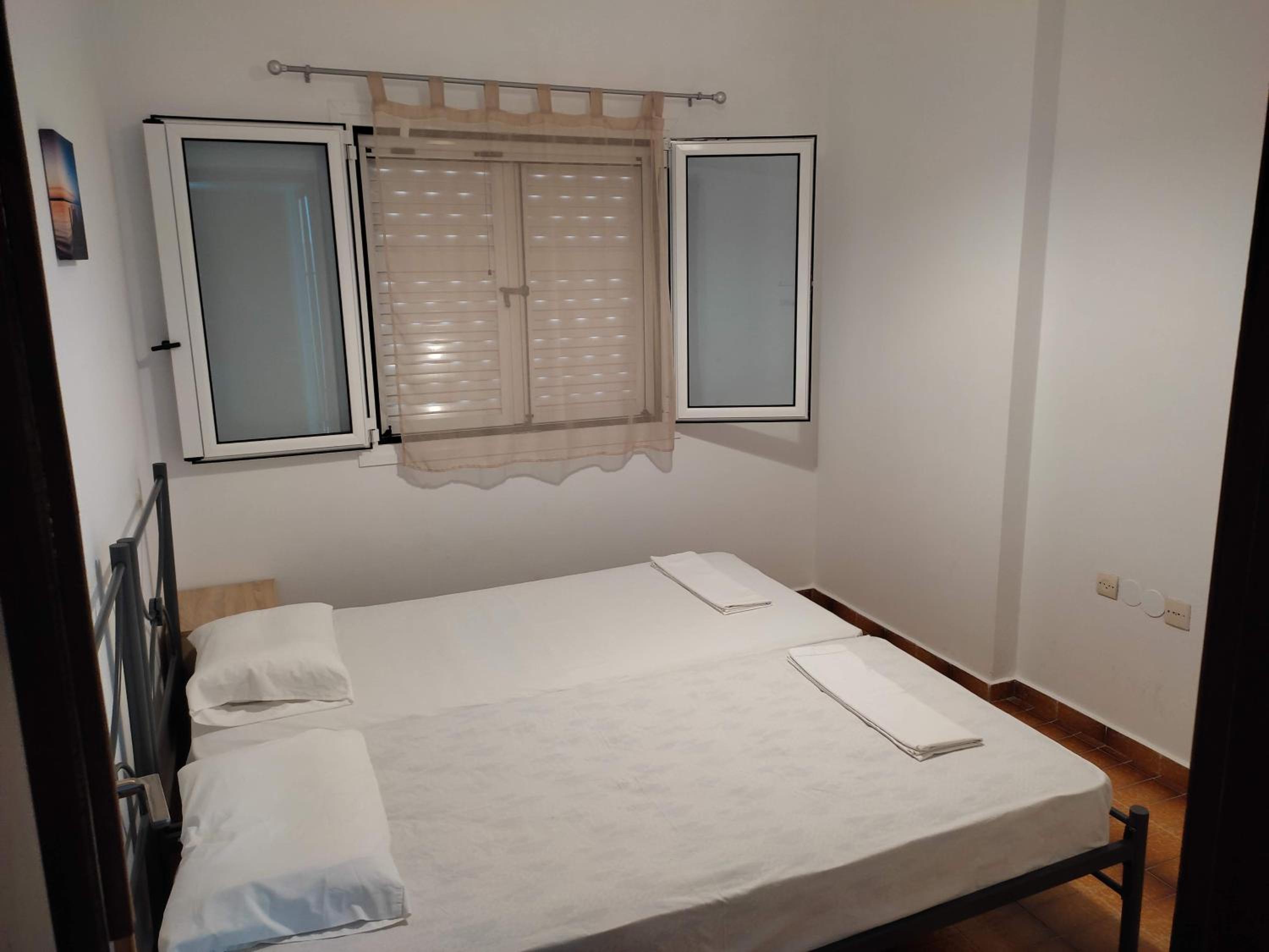 Three-Bedroom Apartment photo 1