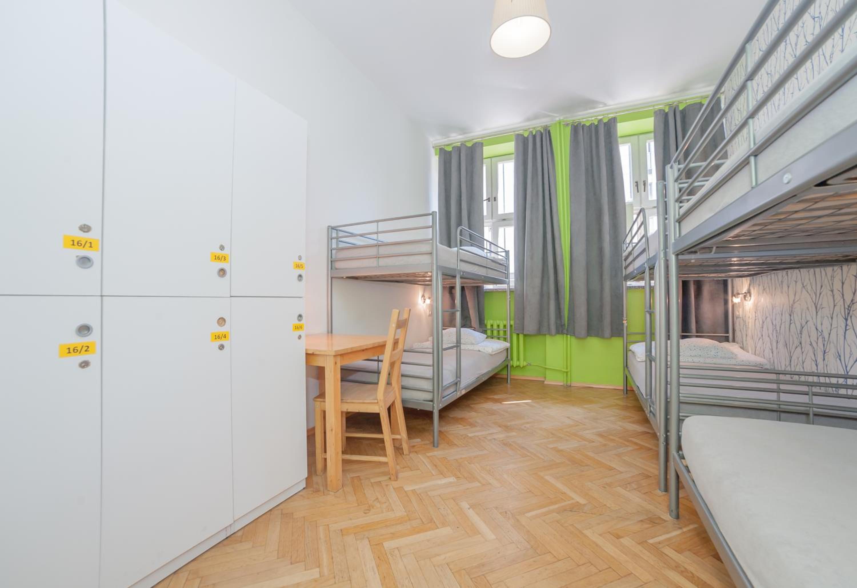 Bed in 6-Bed Dormitory Room with Shared Bathroom