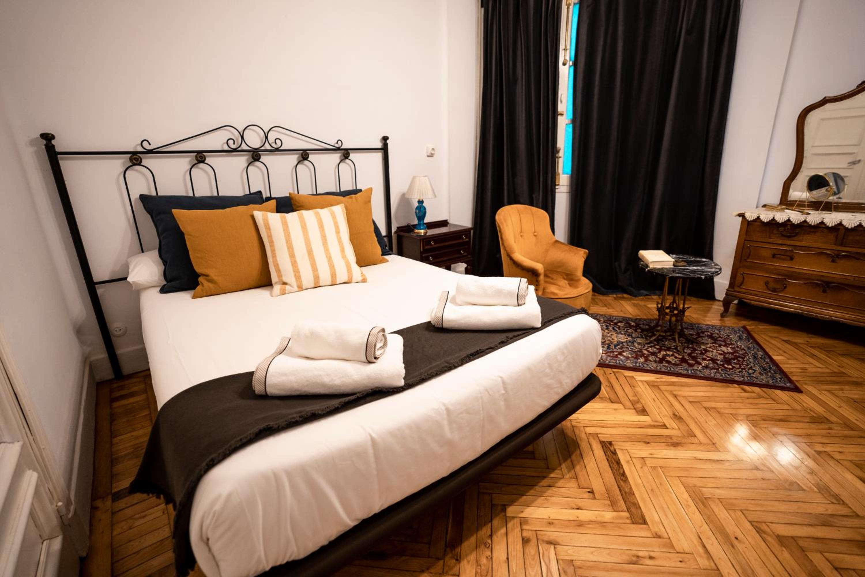 Habitación Triple con Baño Compartido