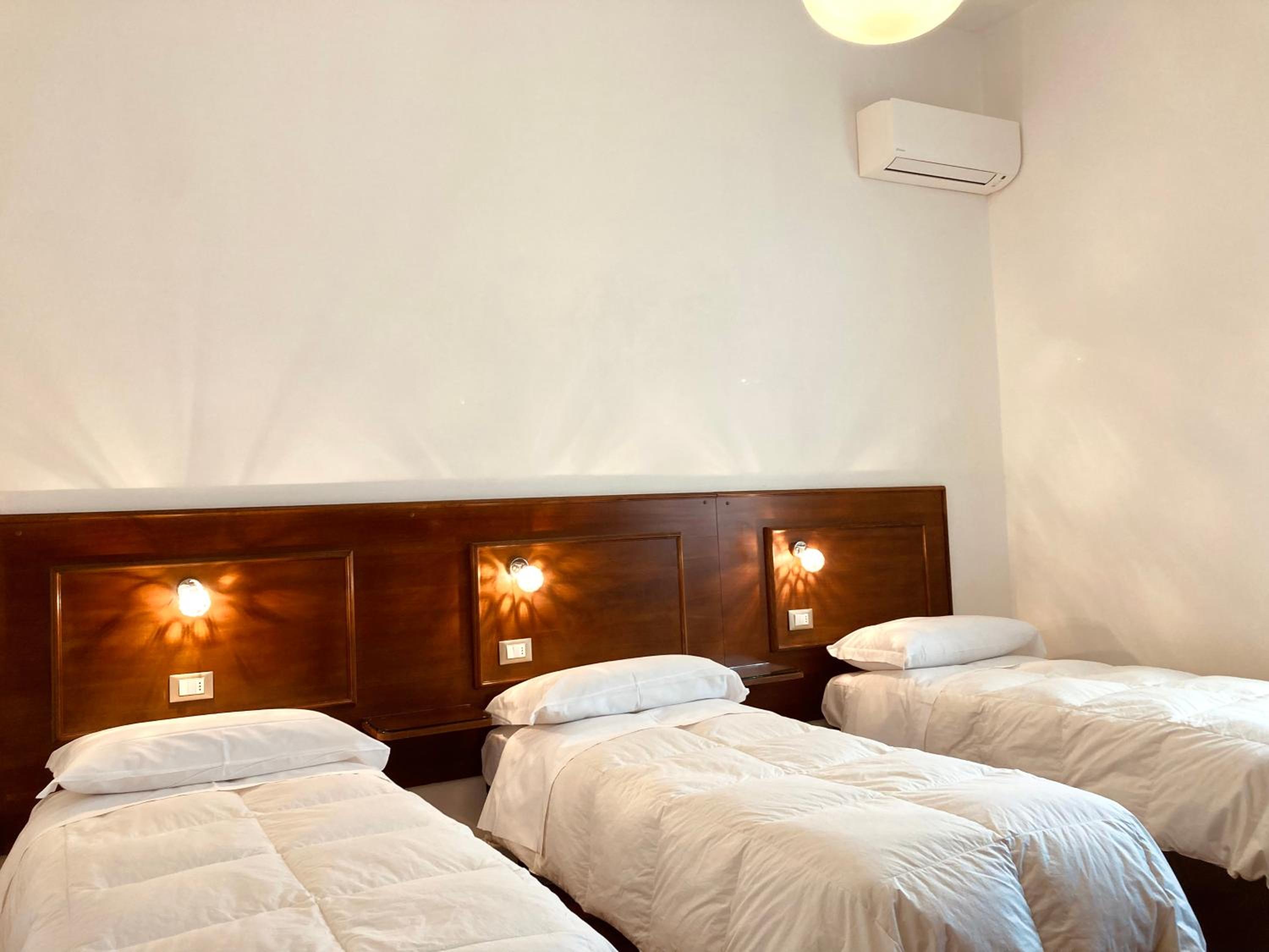 Standard Triple Room - Photo 6