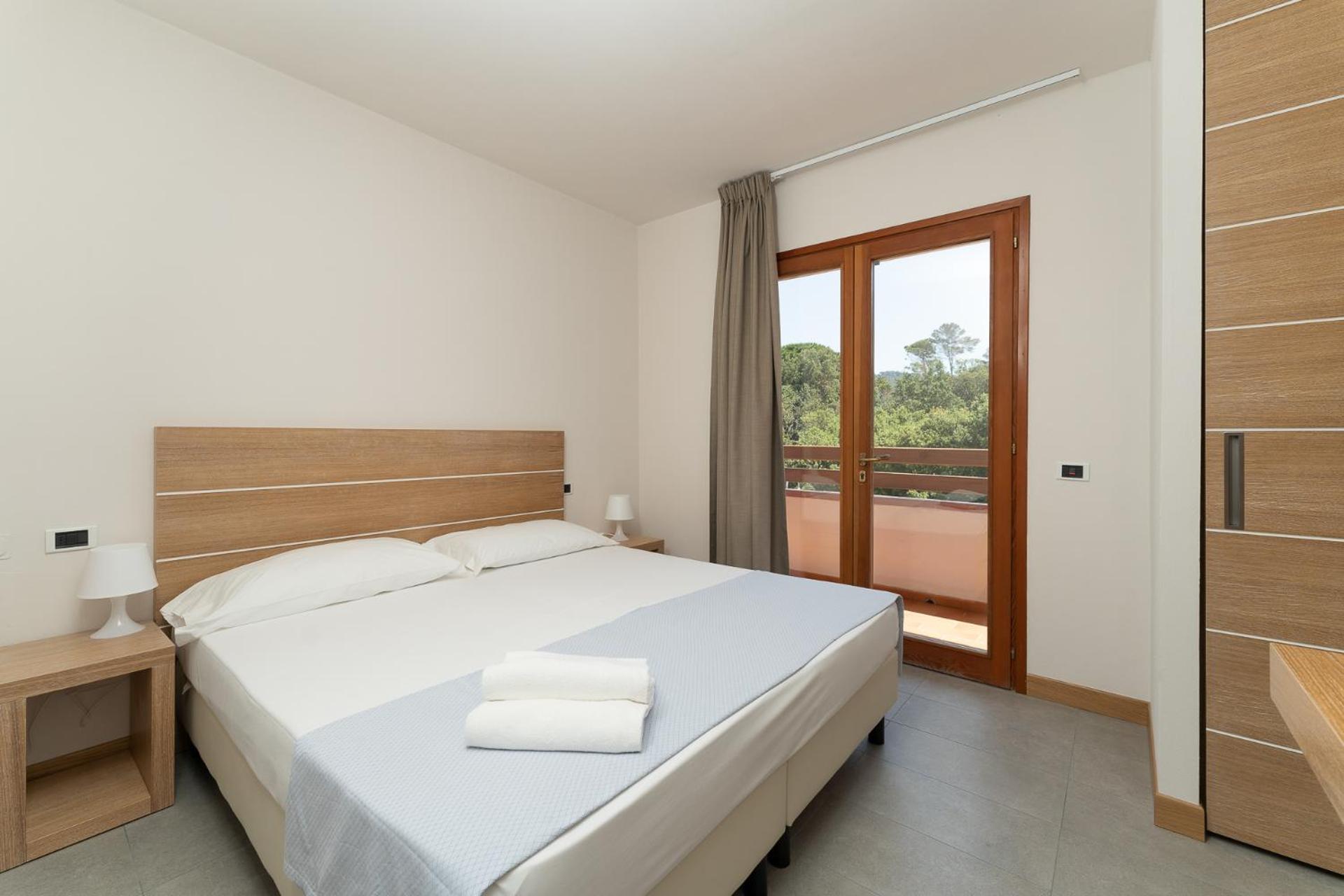 Quadruple Room with Balcony - Photo 1