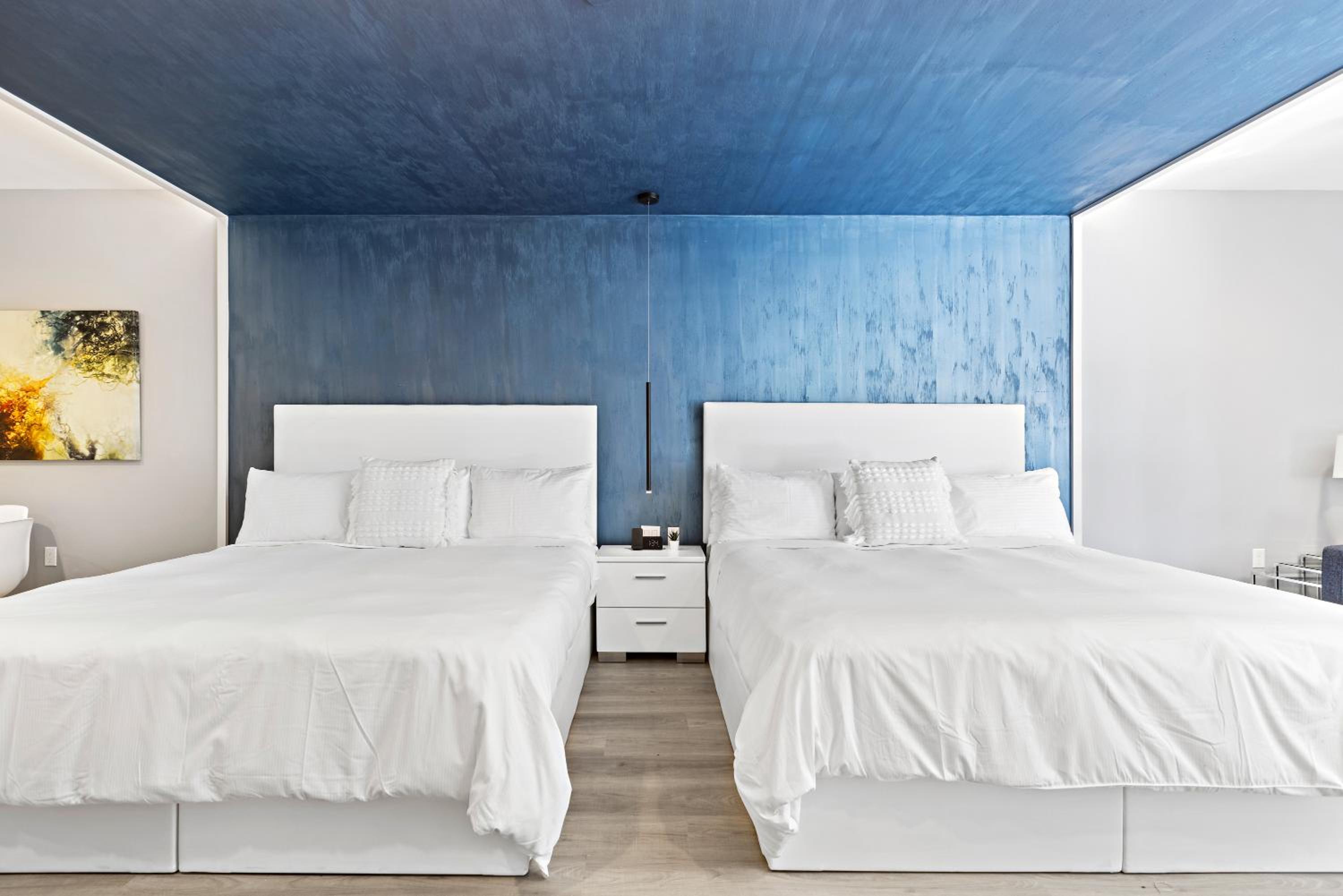 Deluxe King Suite with Two King Beds, Non-Smoking - Photo 1