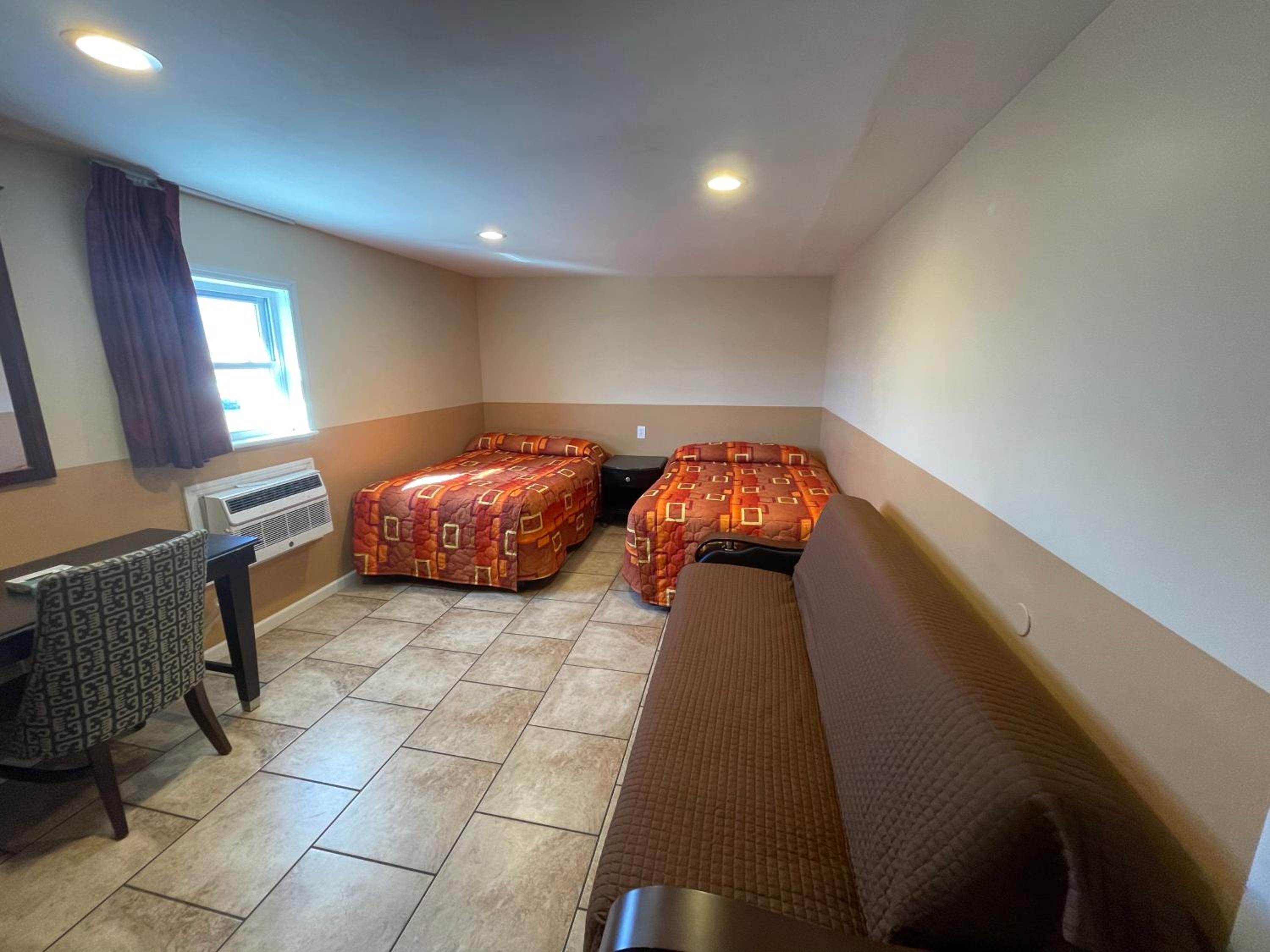 Three-Bedroom Apartment - Photo 14