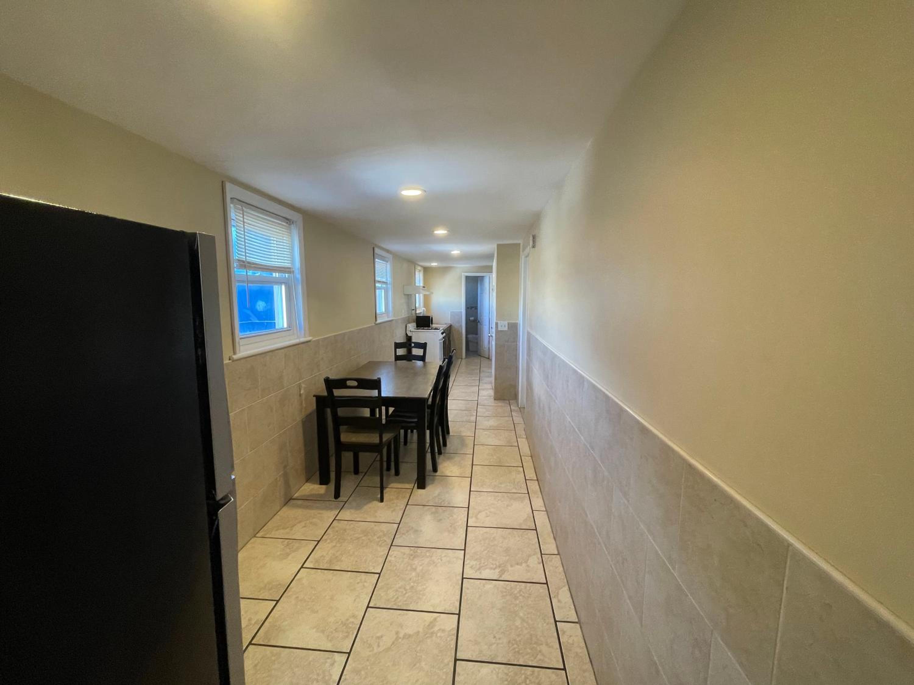 Three-Bedroom Apartment - Photo 9