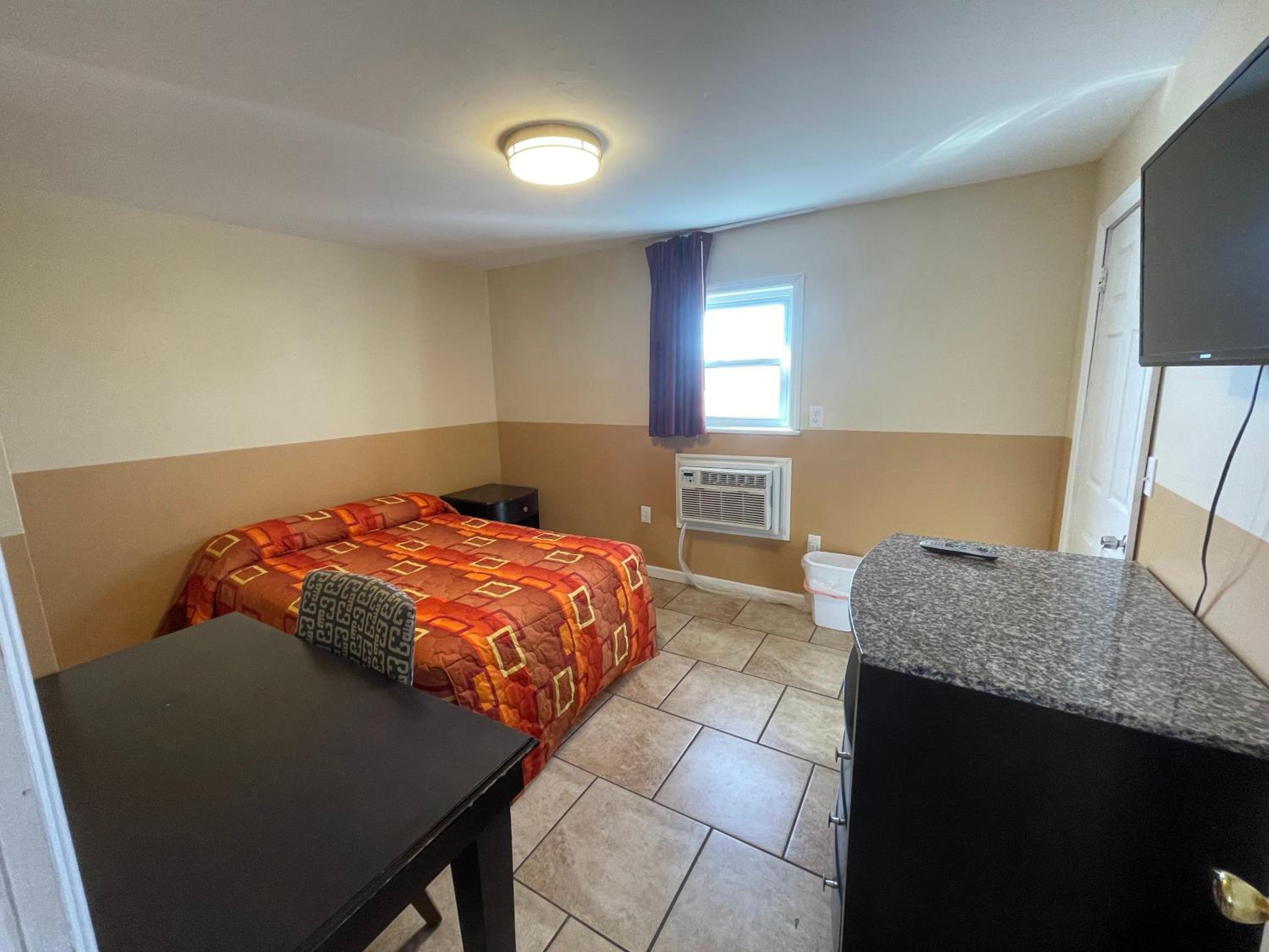 Three-Bedroom Apartment - Photo 11