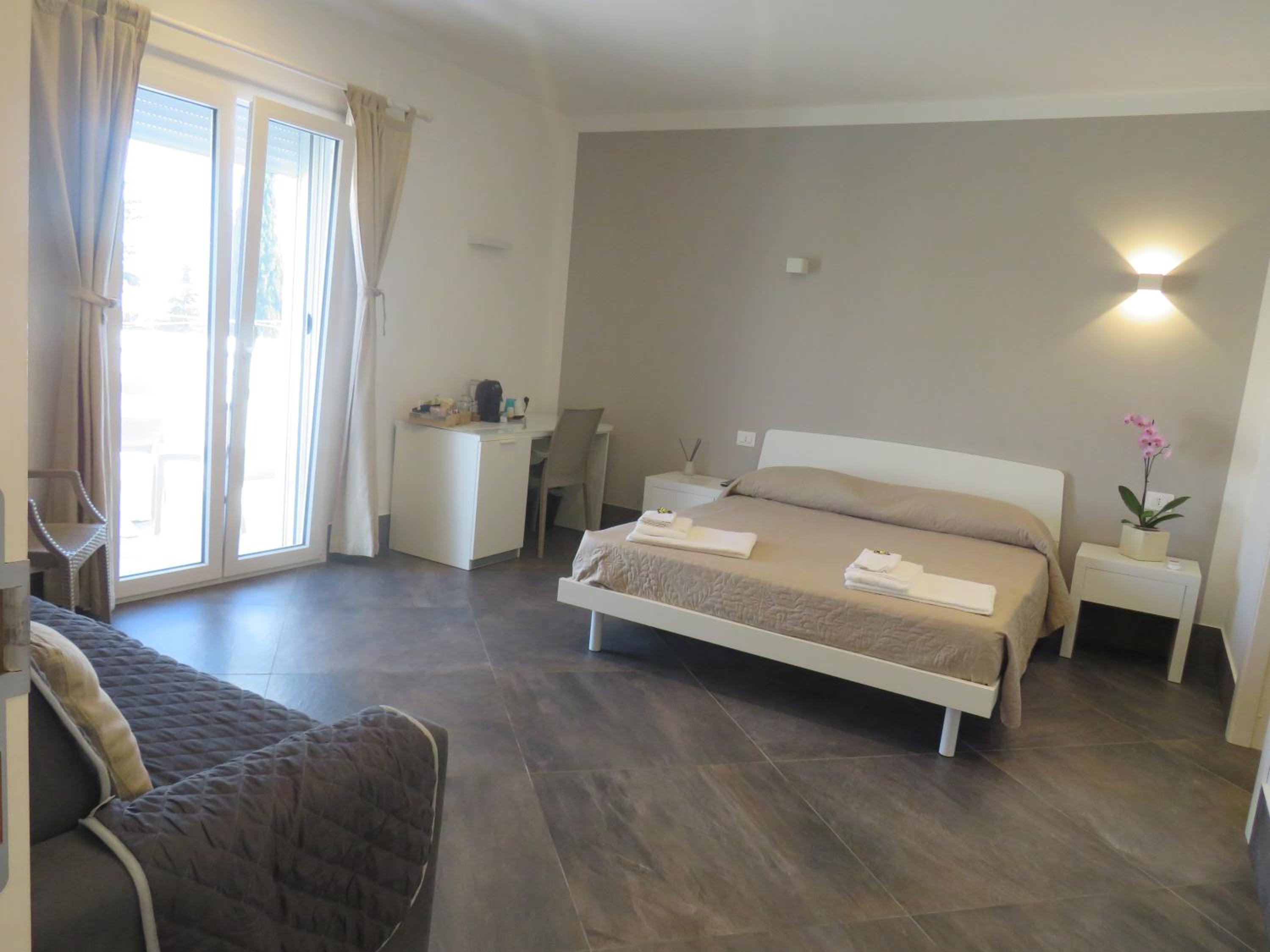 Quadruple Room - Photo 1