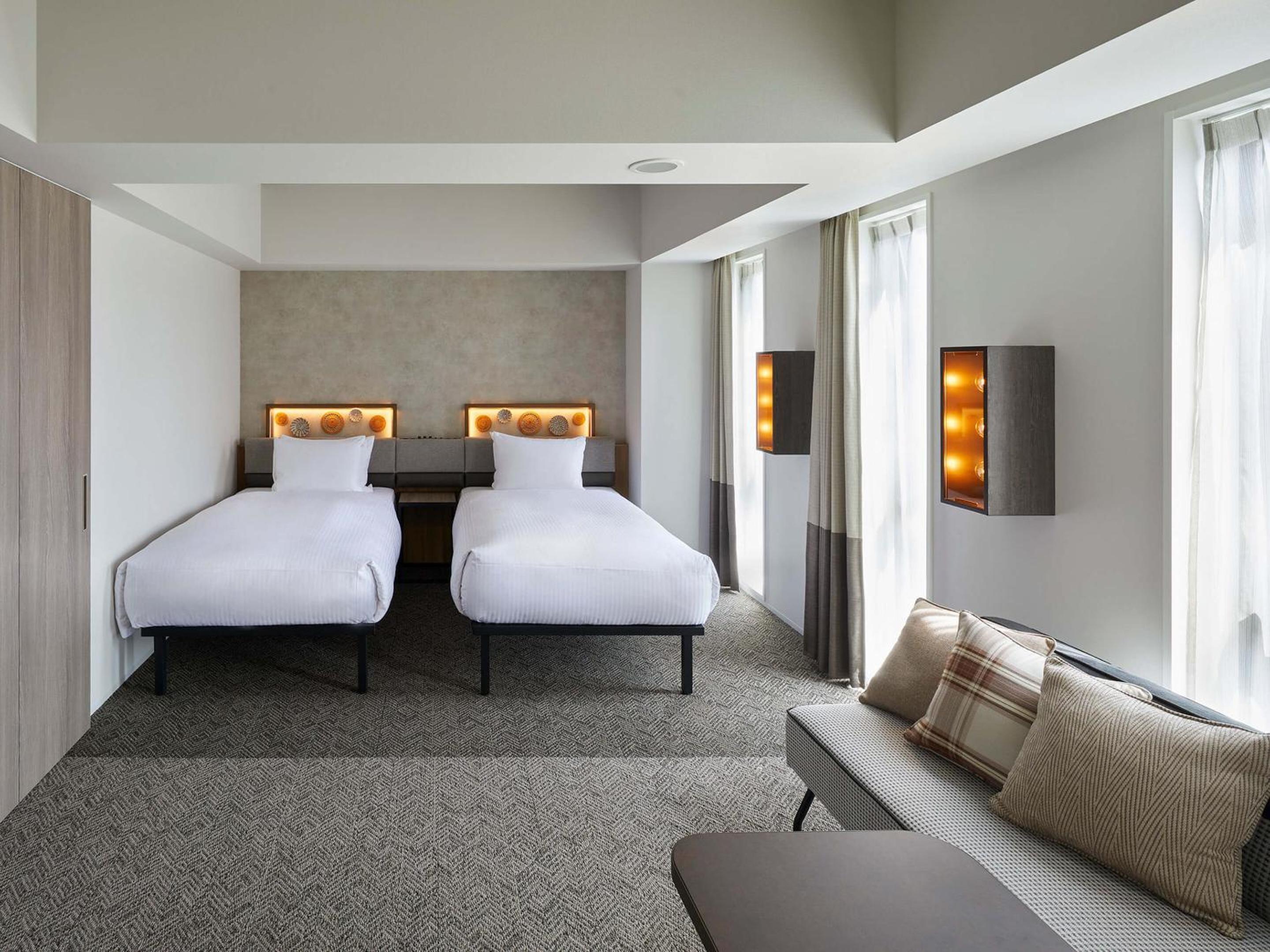 Universal Twin Room - Photo 7