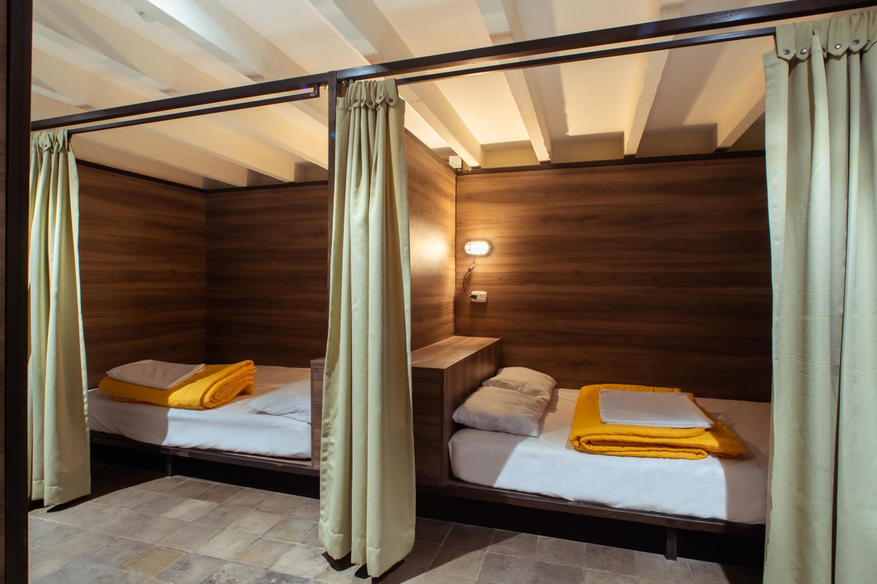 Single Bed in 4-Mixed Bed Dormitory Room