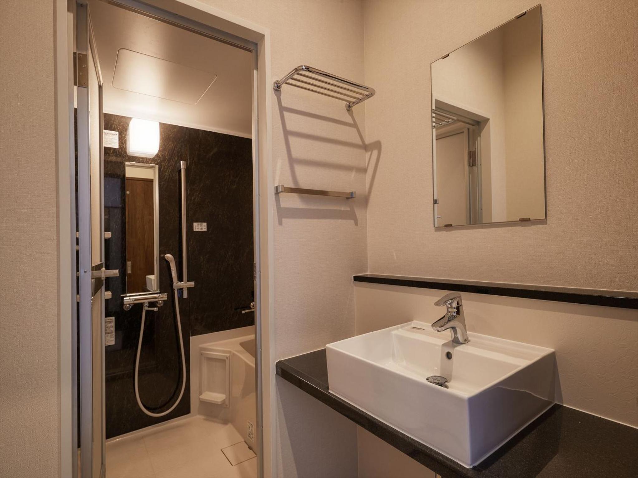 Deluxe Twin Room - Photo 16