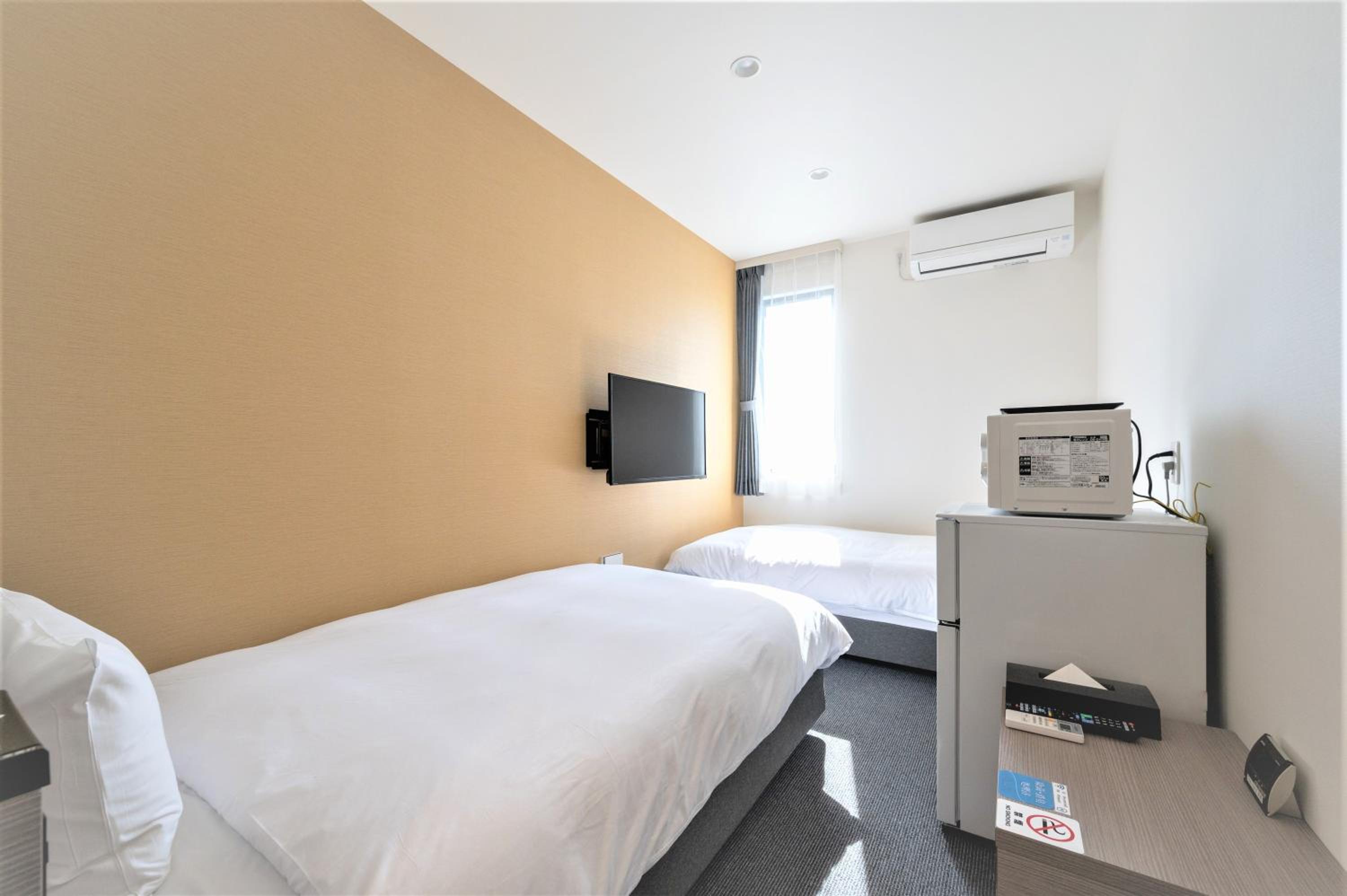Standard Twin Room - Photo 1