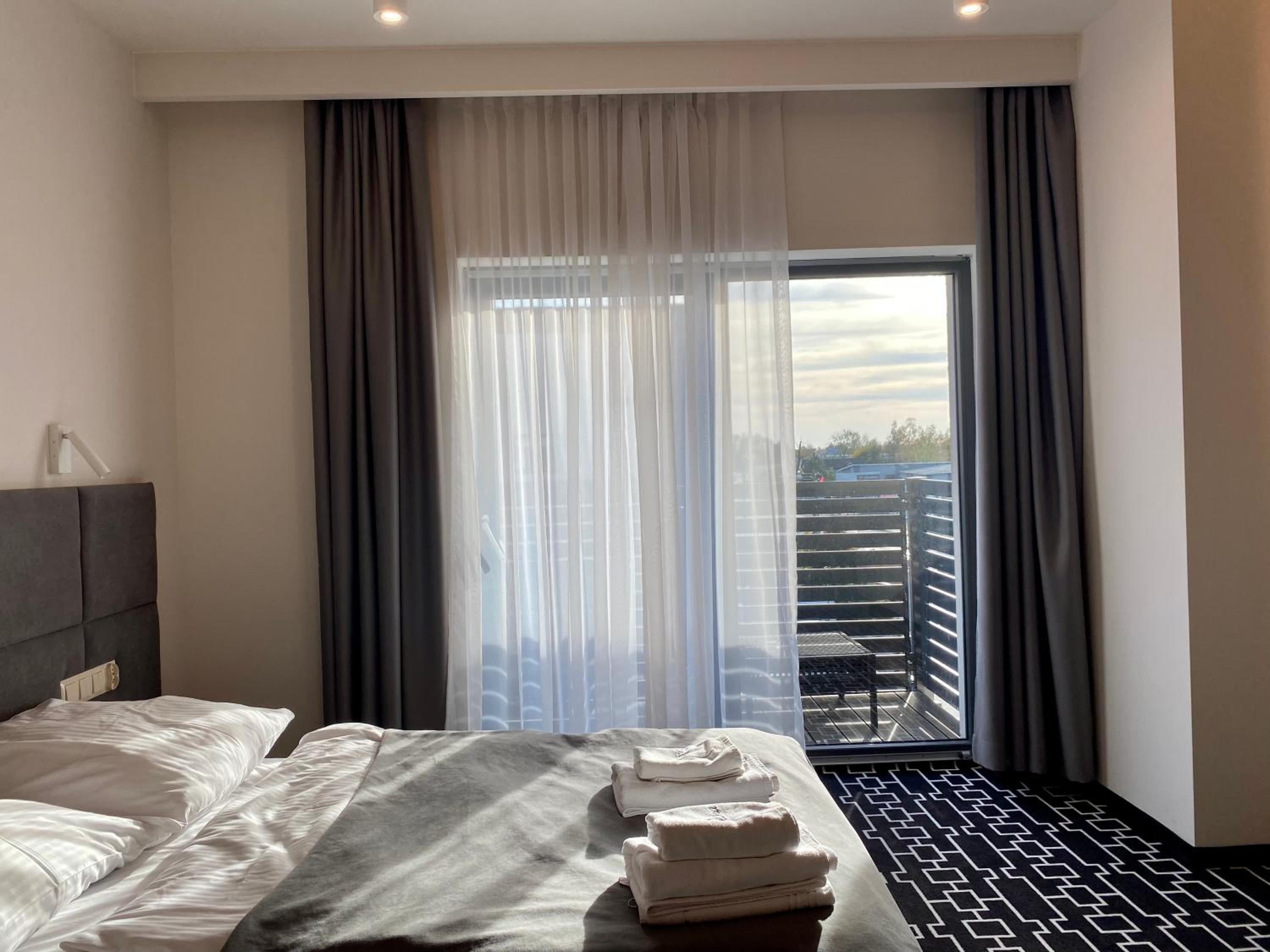 Deluxe Double Room with Balcony - Photo 1