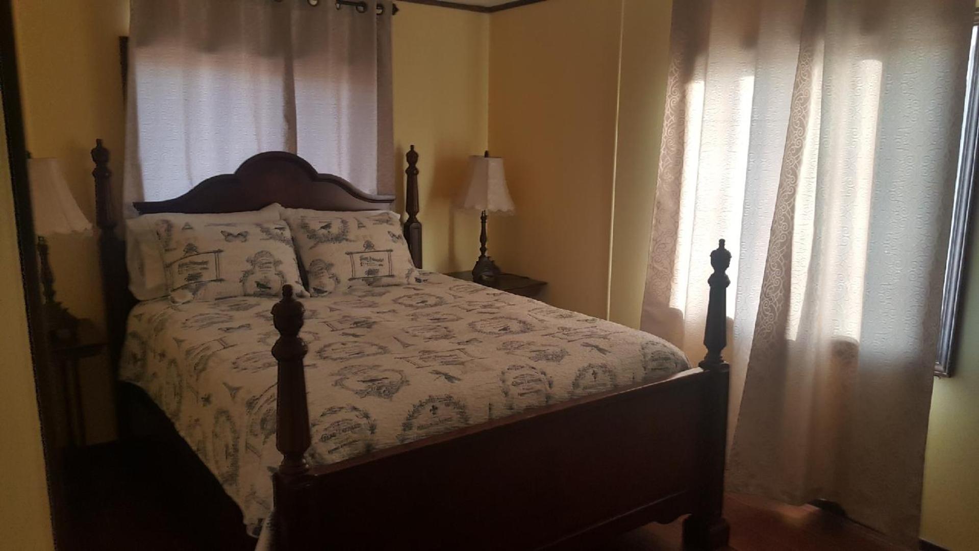 Three-Bedroom House - Photo 24