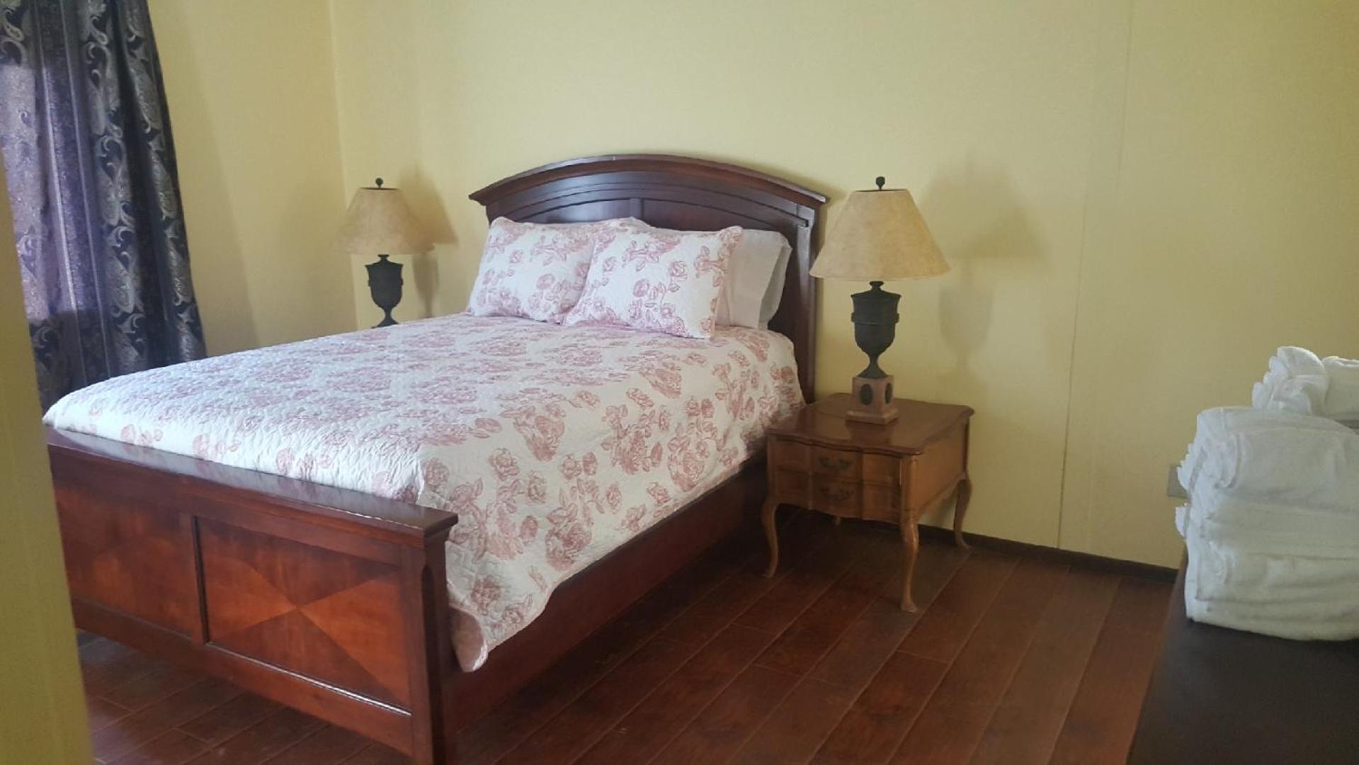 Three-Bedroom House - Photo 8