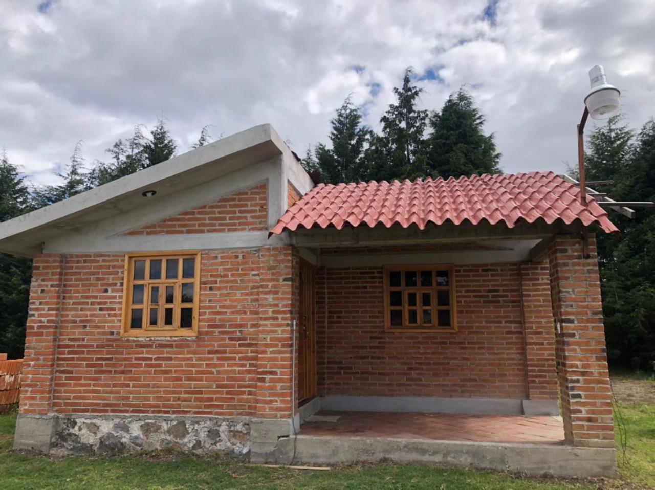 Three-Bedroom House - Photo 2
