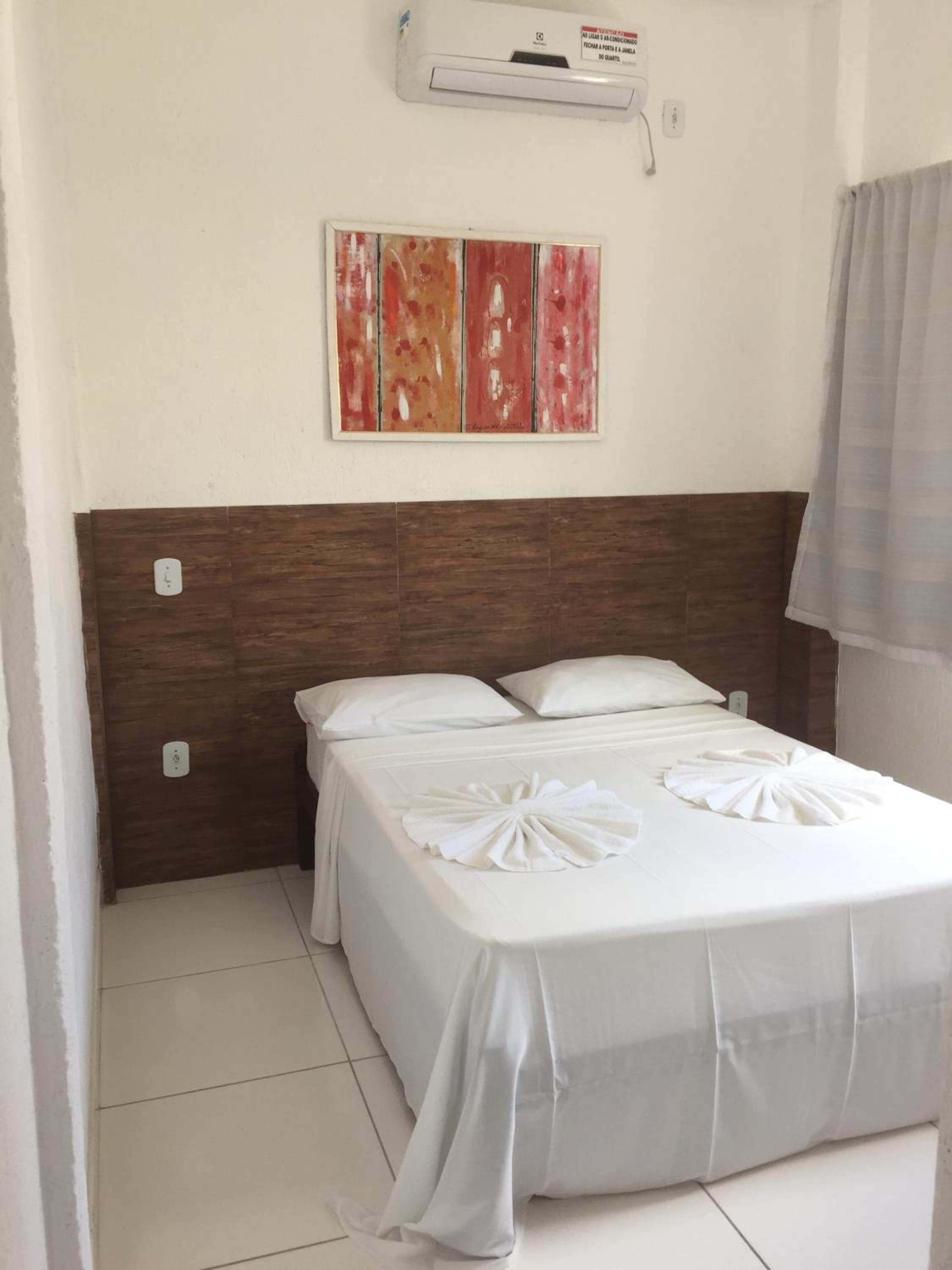 Three-Bedroom Apartment with Balcony and Pool View - Photo 13