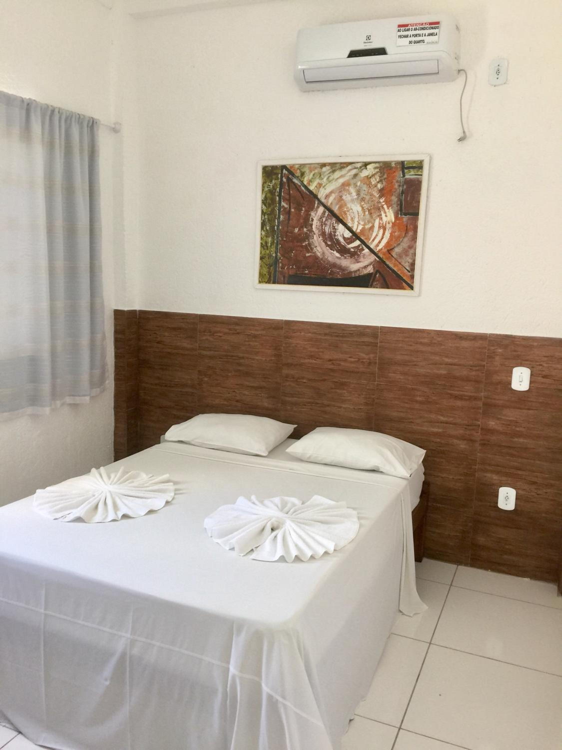 Three-Bedroom Apartment with Balcony and Pool View - Photo 1