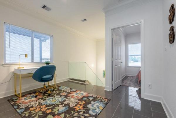 Three-Bedroom House - Photo 32