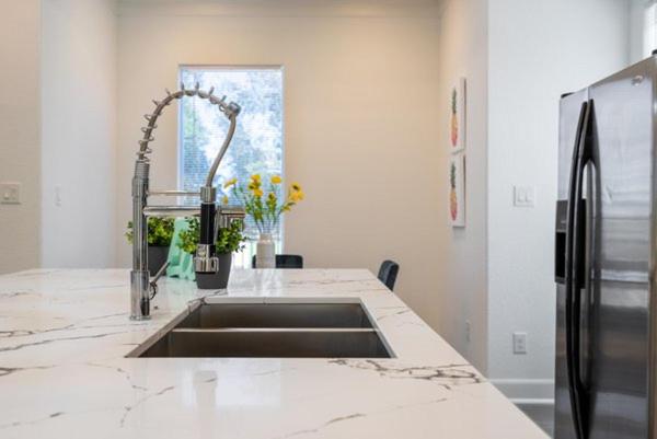 Three-Bedroom House - Photo 28