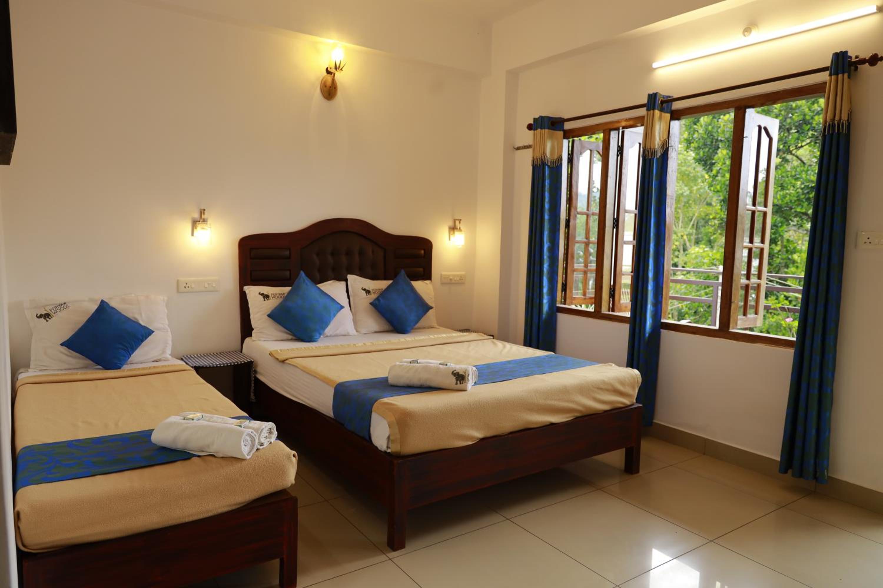 Deluxe Triple Room - Photo 11