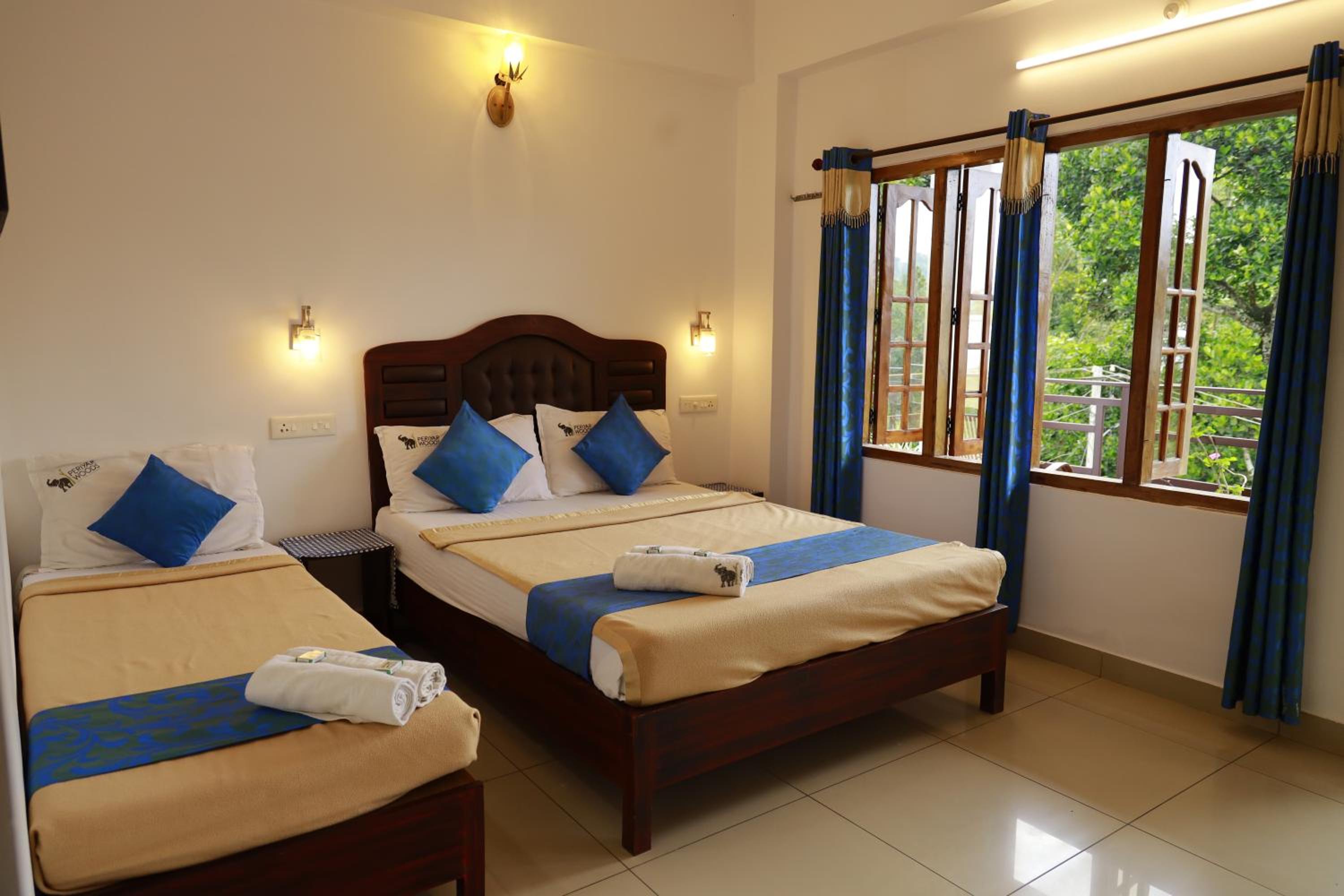 Deluxe Triple Room - Photo 12