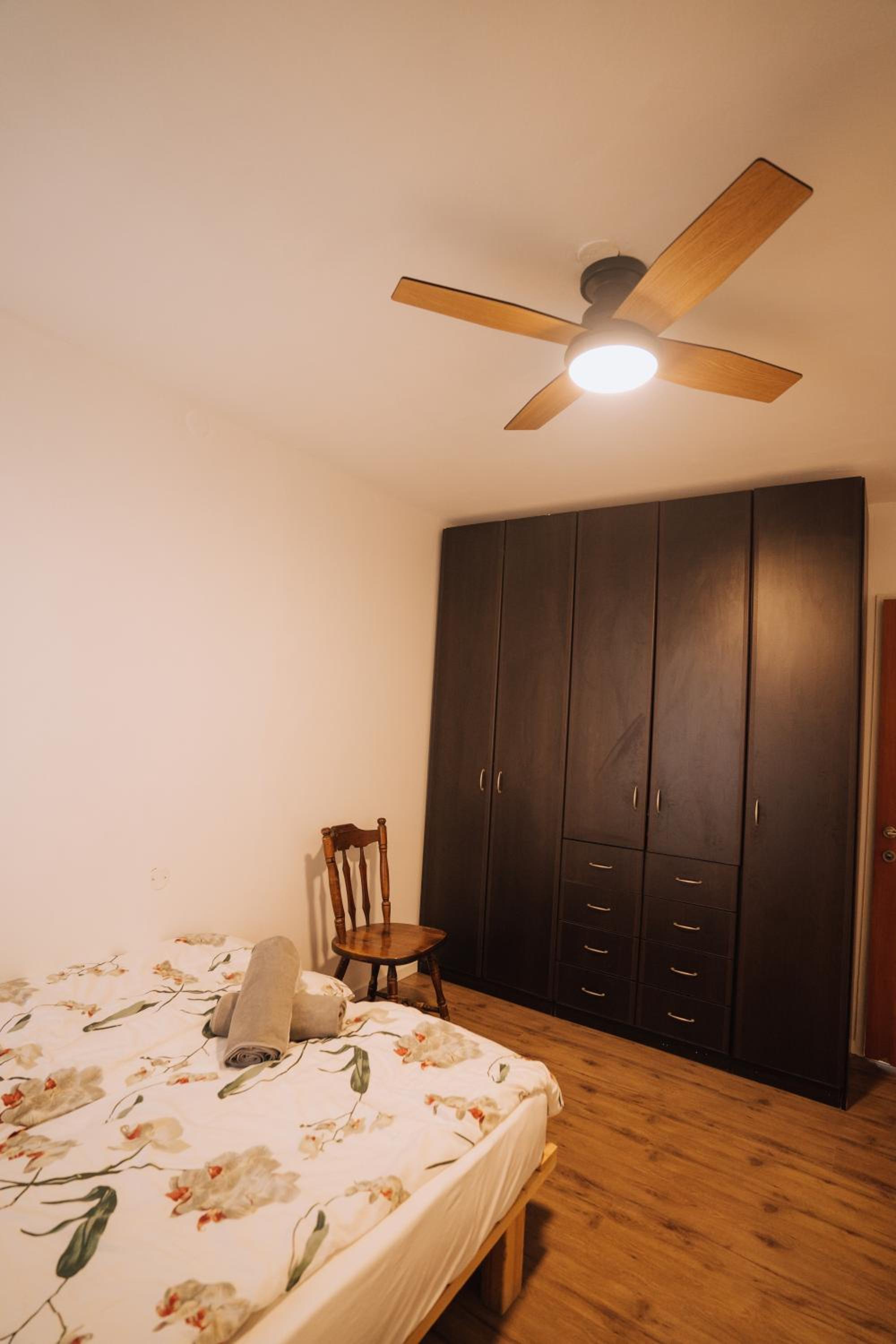 Three-Bedroom Apartment - Photo 12
