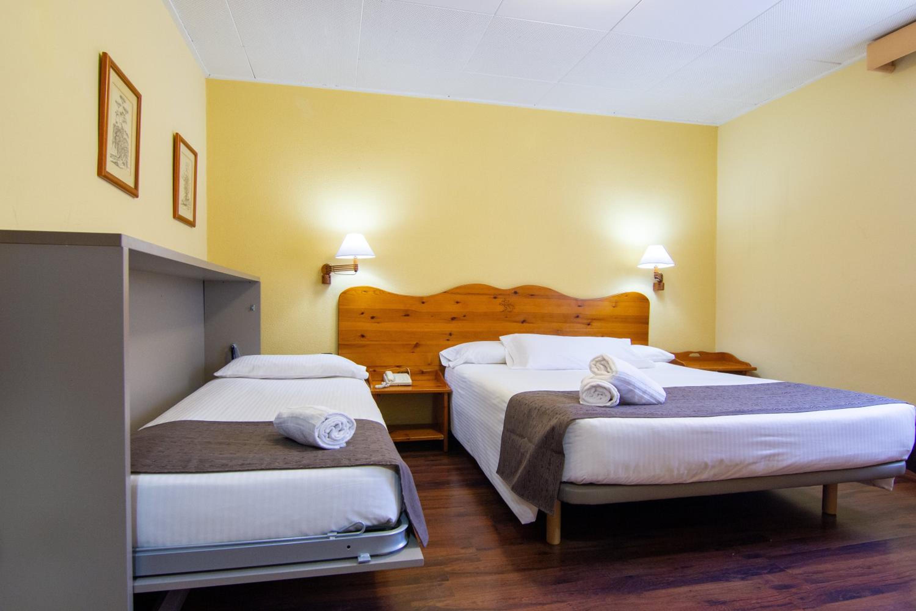 Habitación triple (2 adultos + 1 niño)