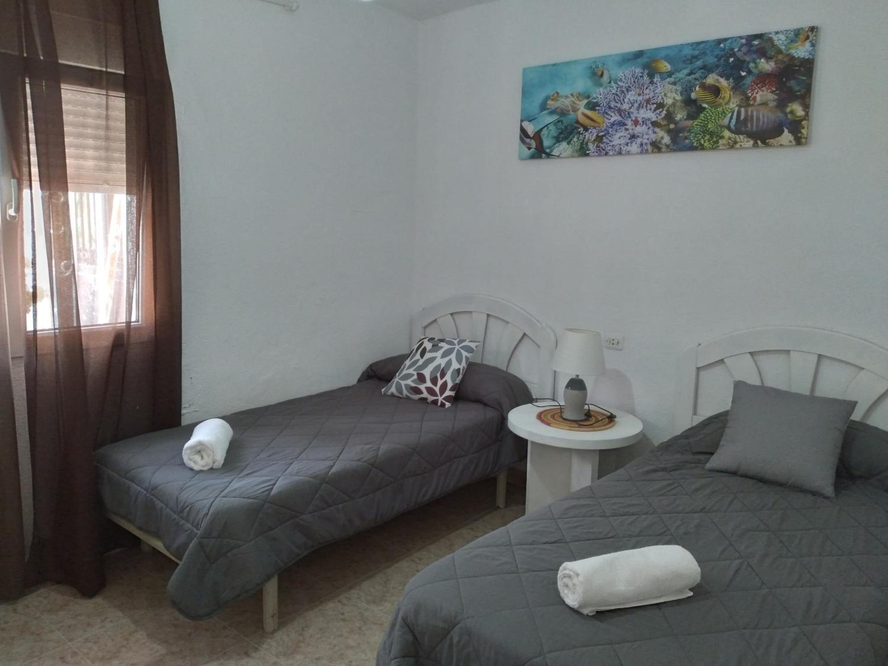 Three-Bedroom Apartment - Photo 1